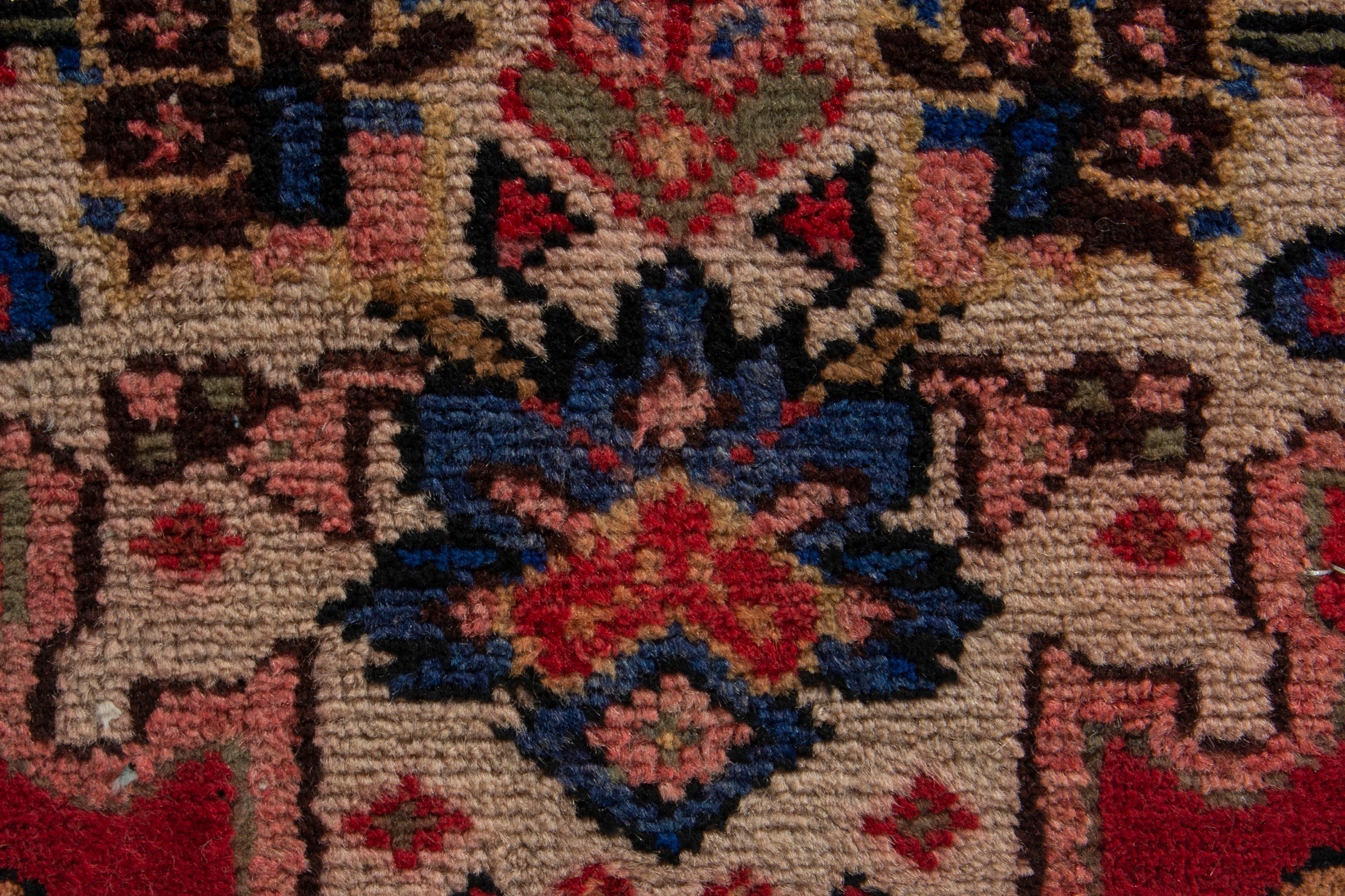 Persian Gharajeh accent rug in muted pink and deep red, view 6 of 9