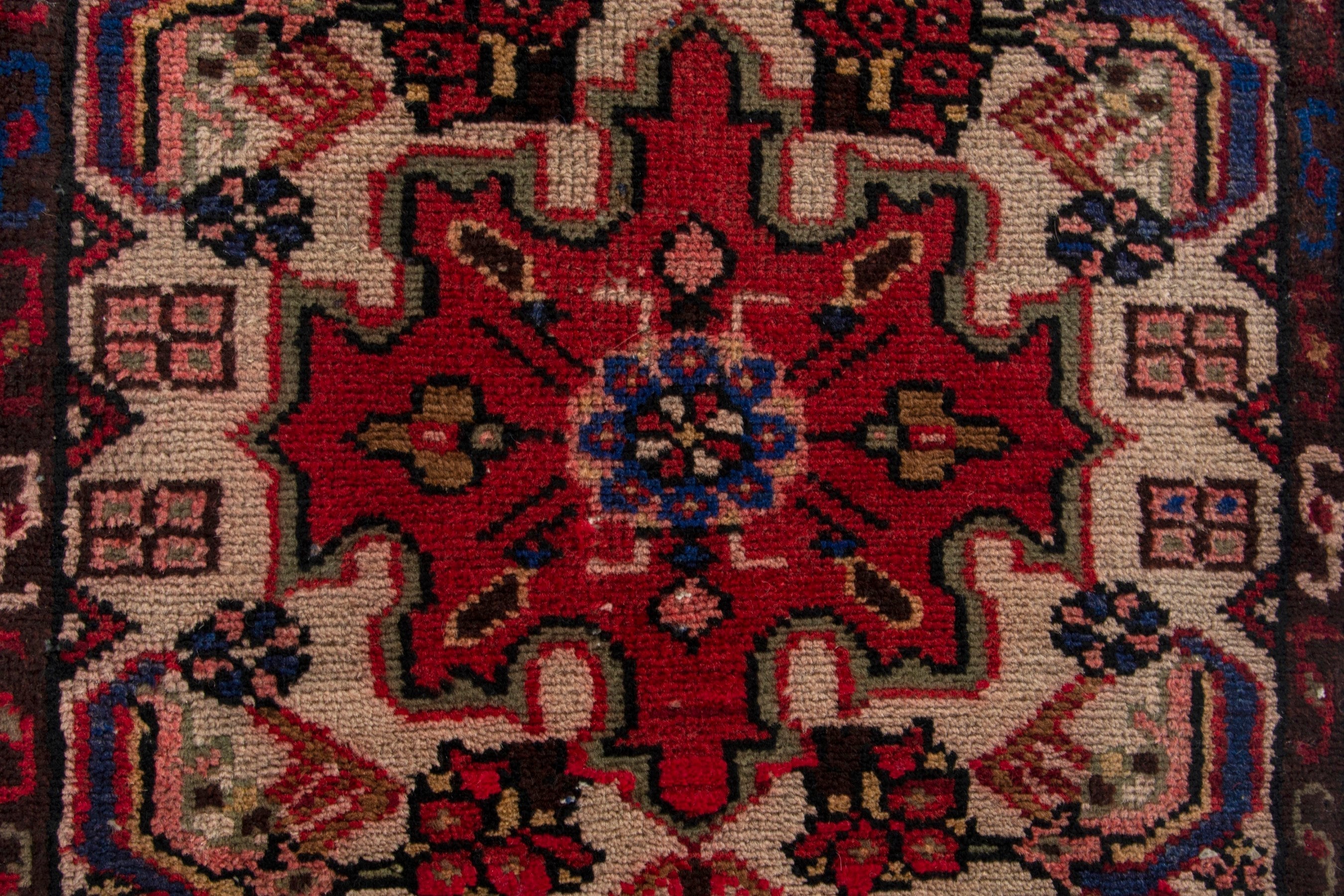 Persian Gharajeh accent rug in muted pink and deep red, view 7 of 9