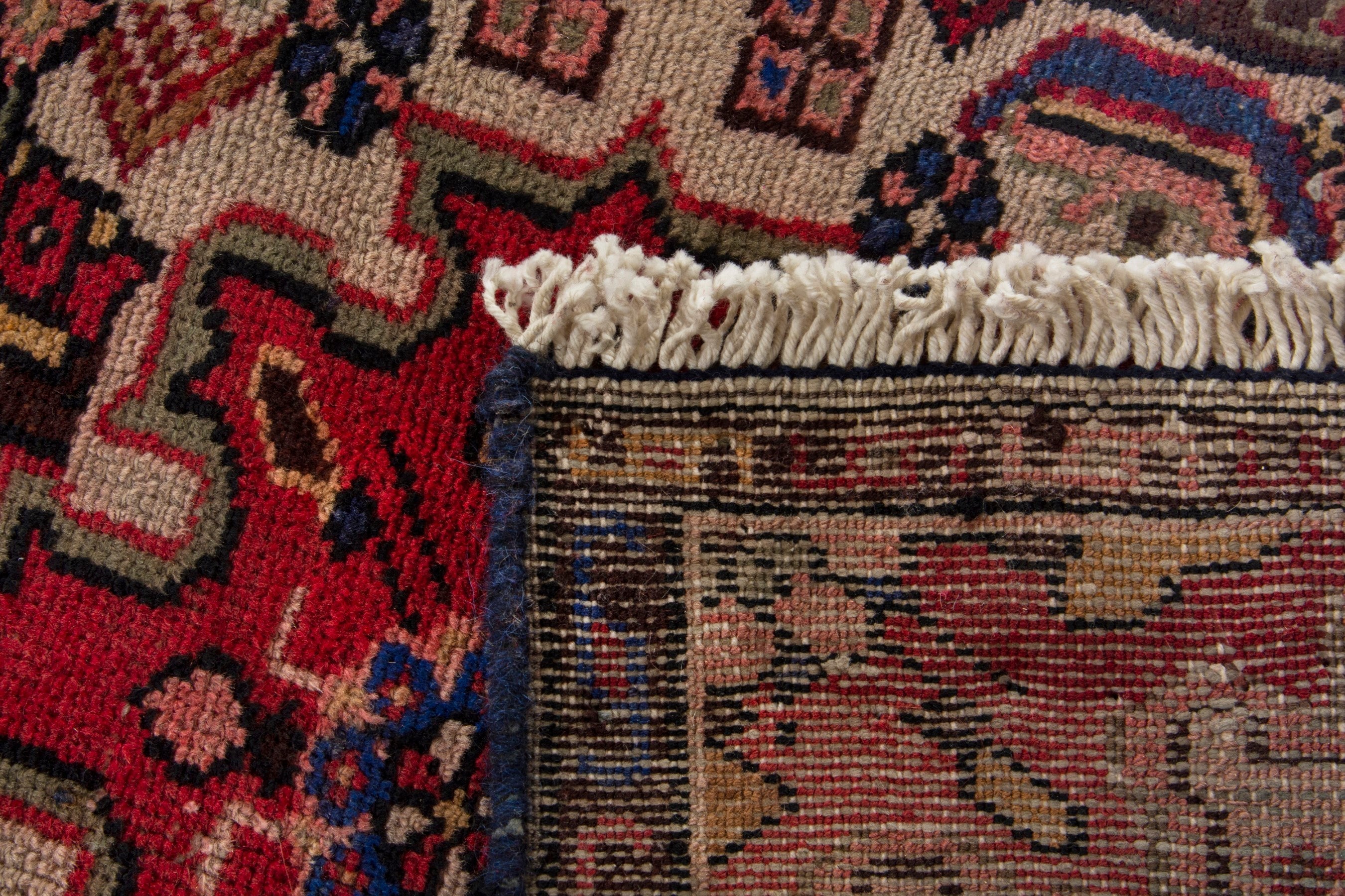 Persian Gharajeh accent rug in muted pink and deep red, view 9 of 9