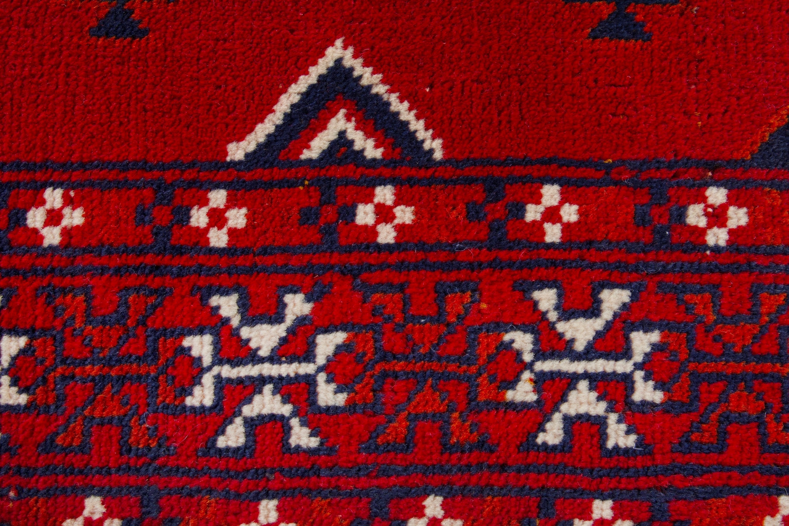 Persian Torkaman accent rug in deep red and burgundy, view 6 of 9
