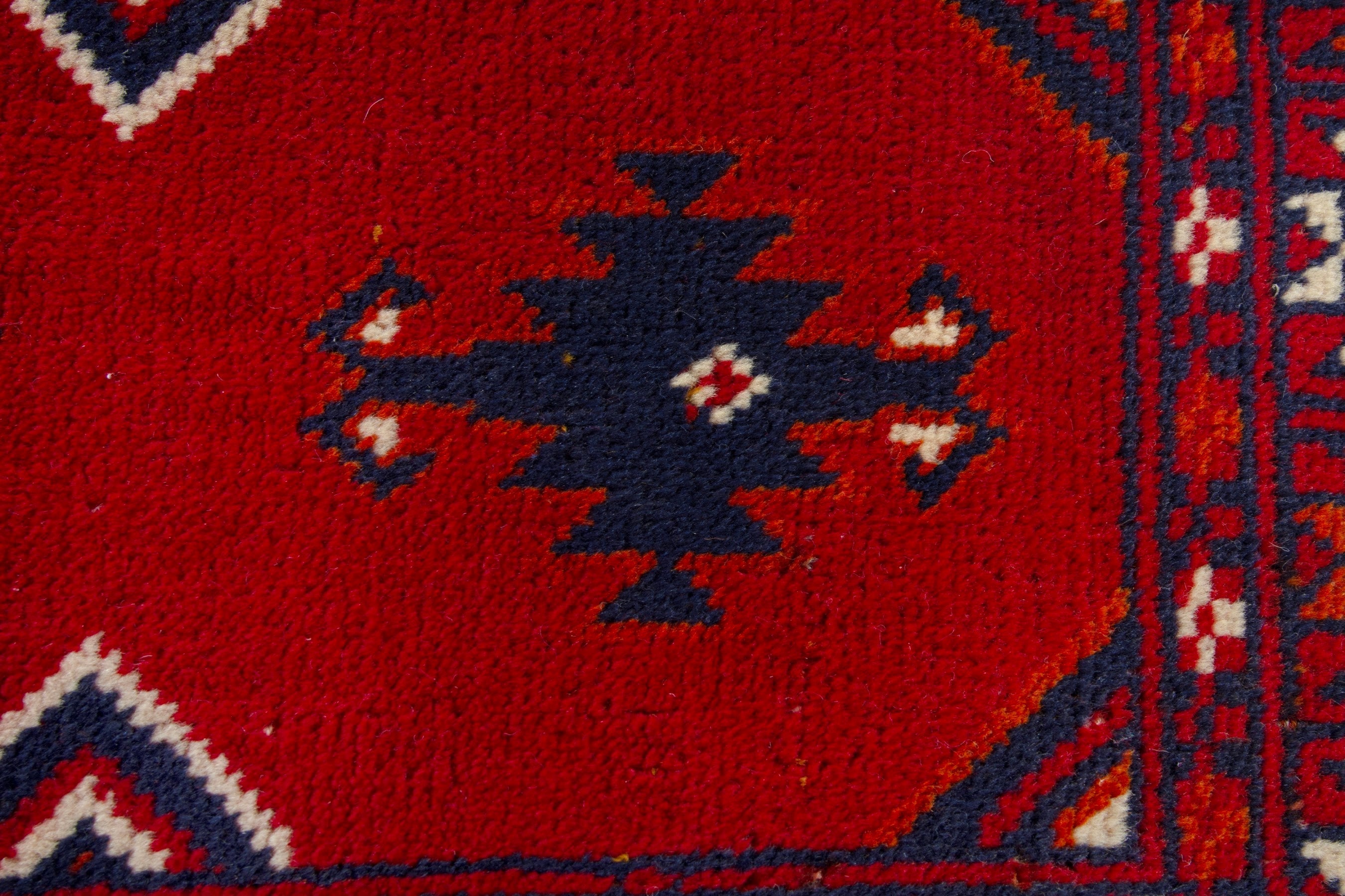 Persian Torkaman accent rug in deep red and burgundy, view 7 of 9