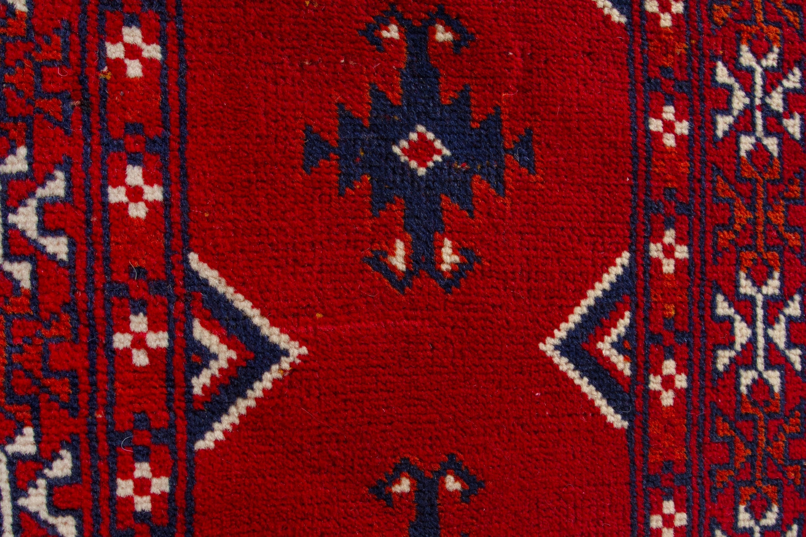 Persian Torkaman accent rug in deep red and burgundy, view 8 of 9