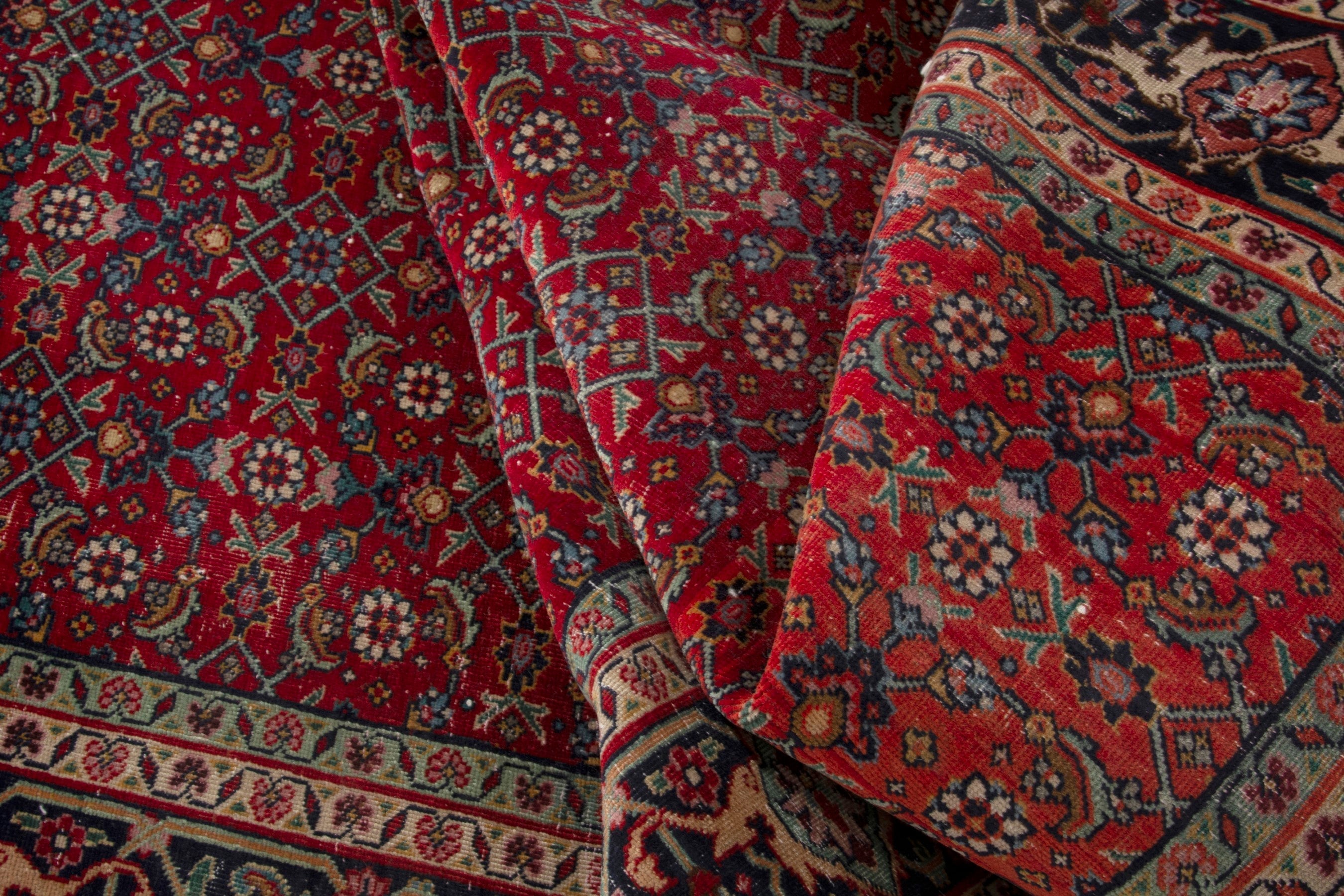 Persian Tabriz area rug in deep red and navy, view 15 of 17