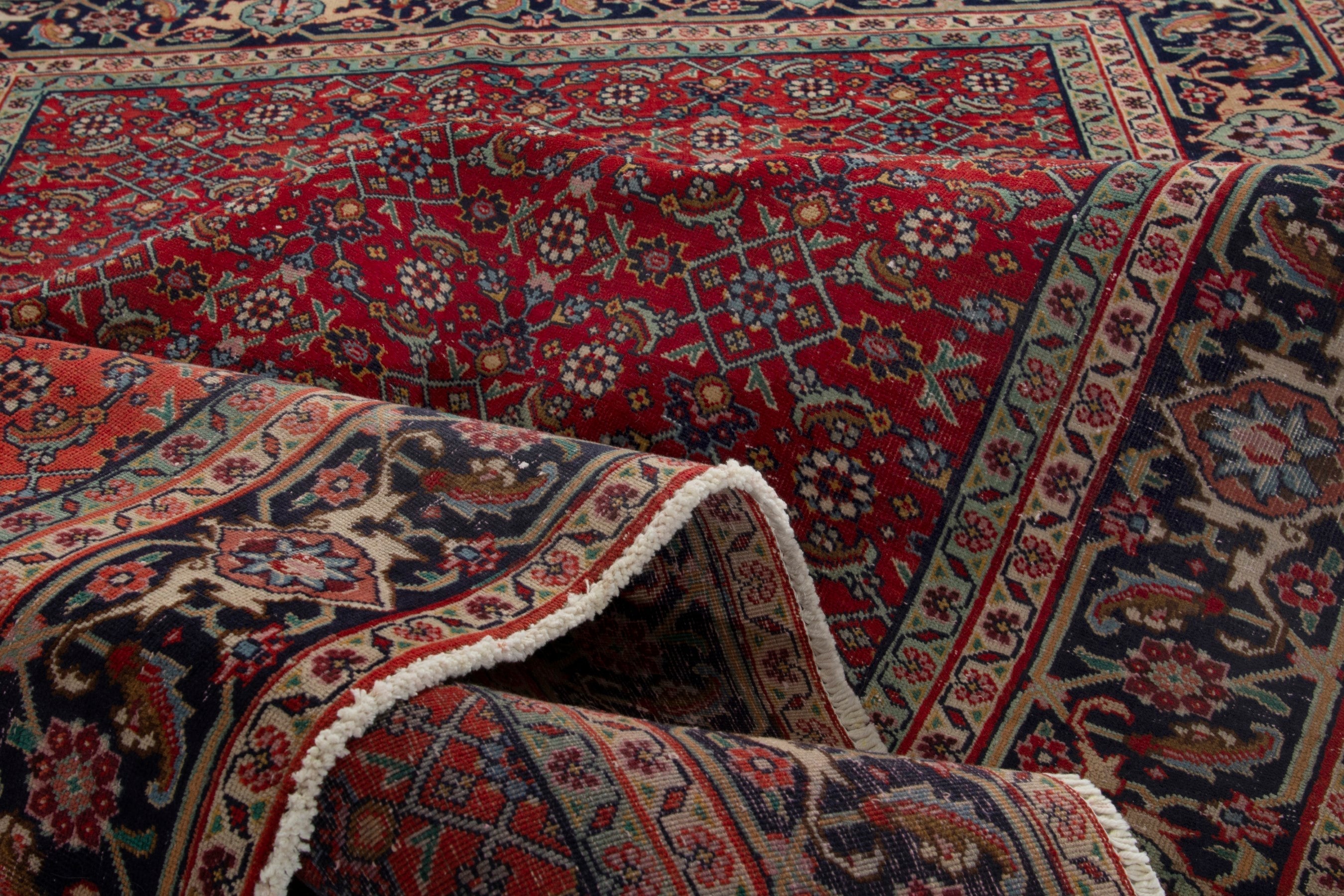 Persian Tabriz area rug in deep red and navy, view 16 of 17