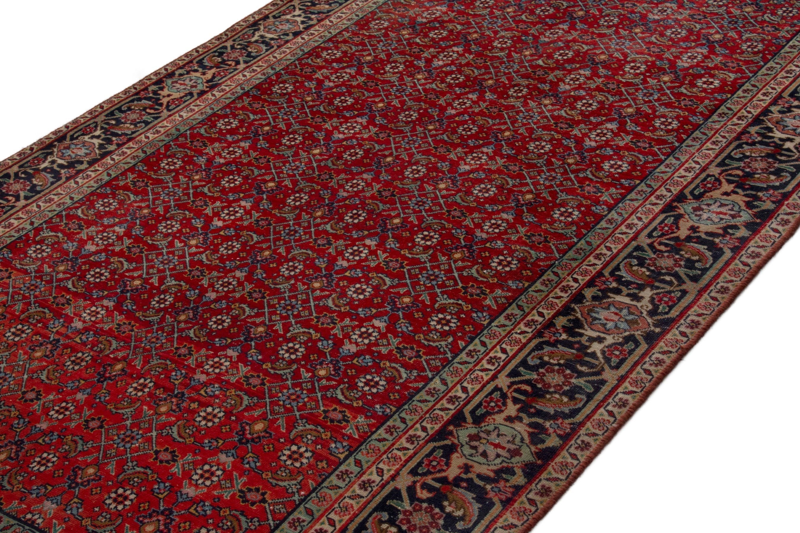 Persian Tabriz area rug in deep red and navy, view 4 of 17