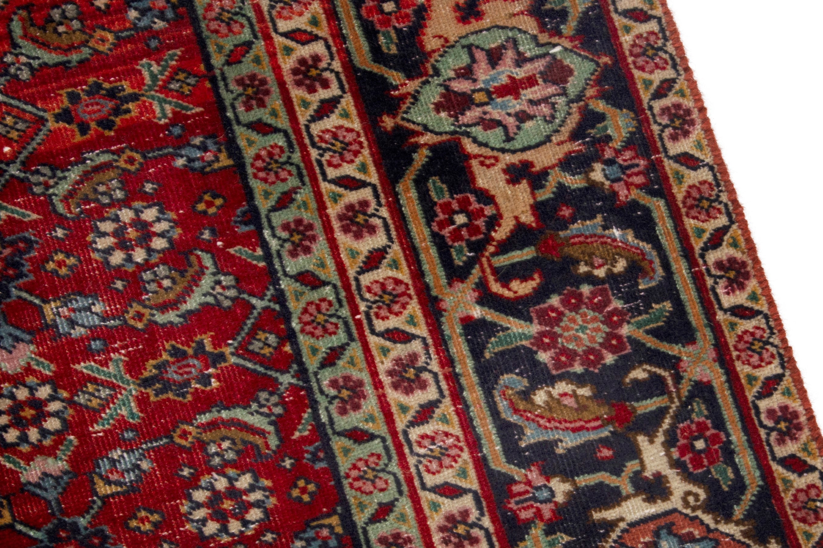 Persian Tabriz area rug in deep red and navy, view 9 of 17