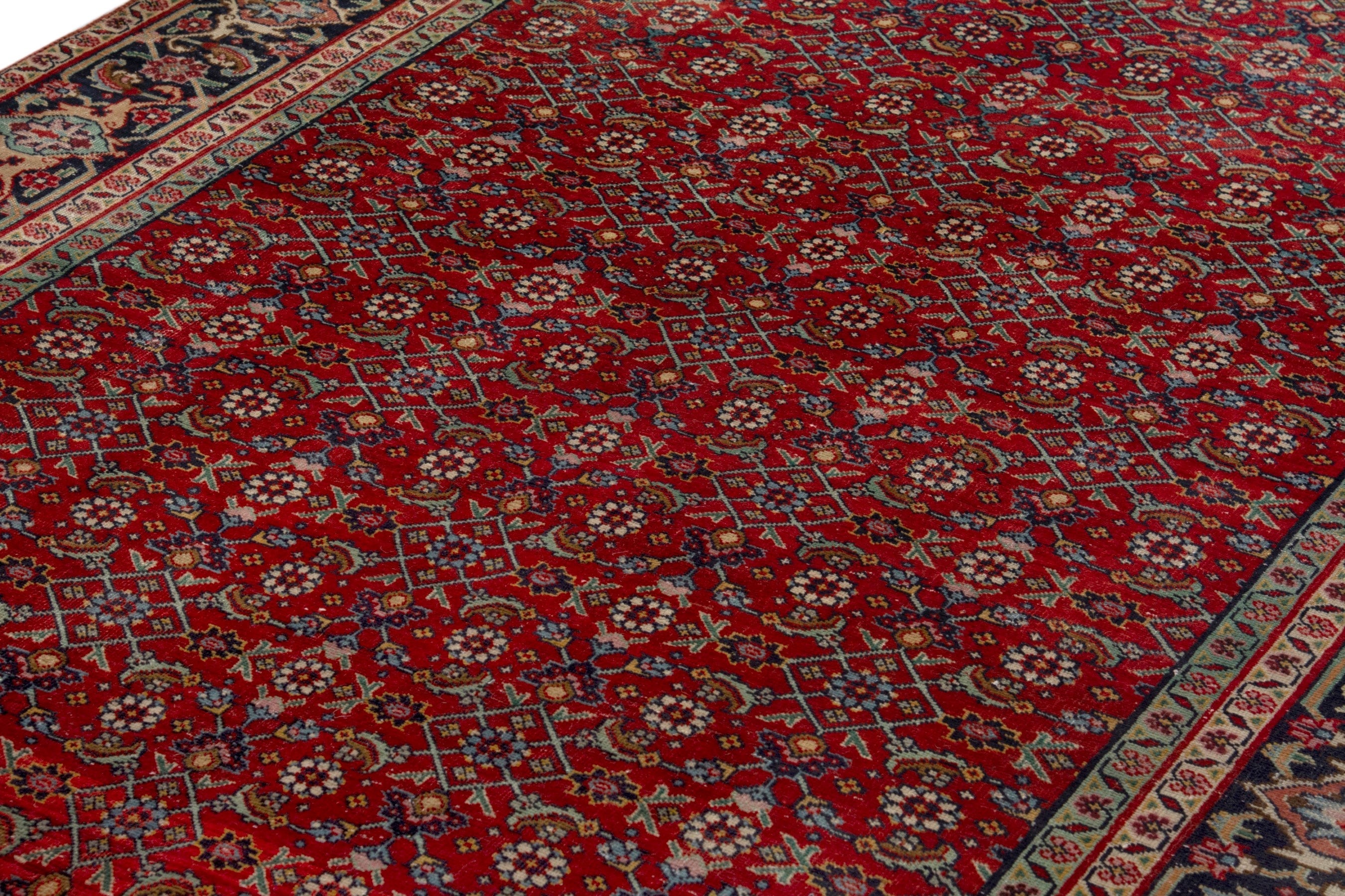 Persian Tabriz area rug in deep red and navy, view 7 of 17
