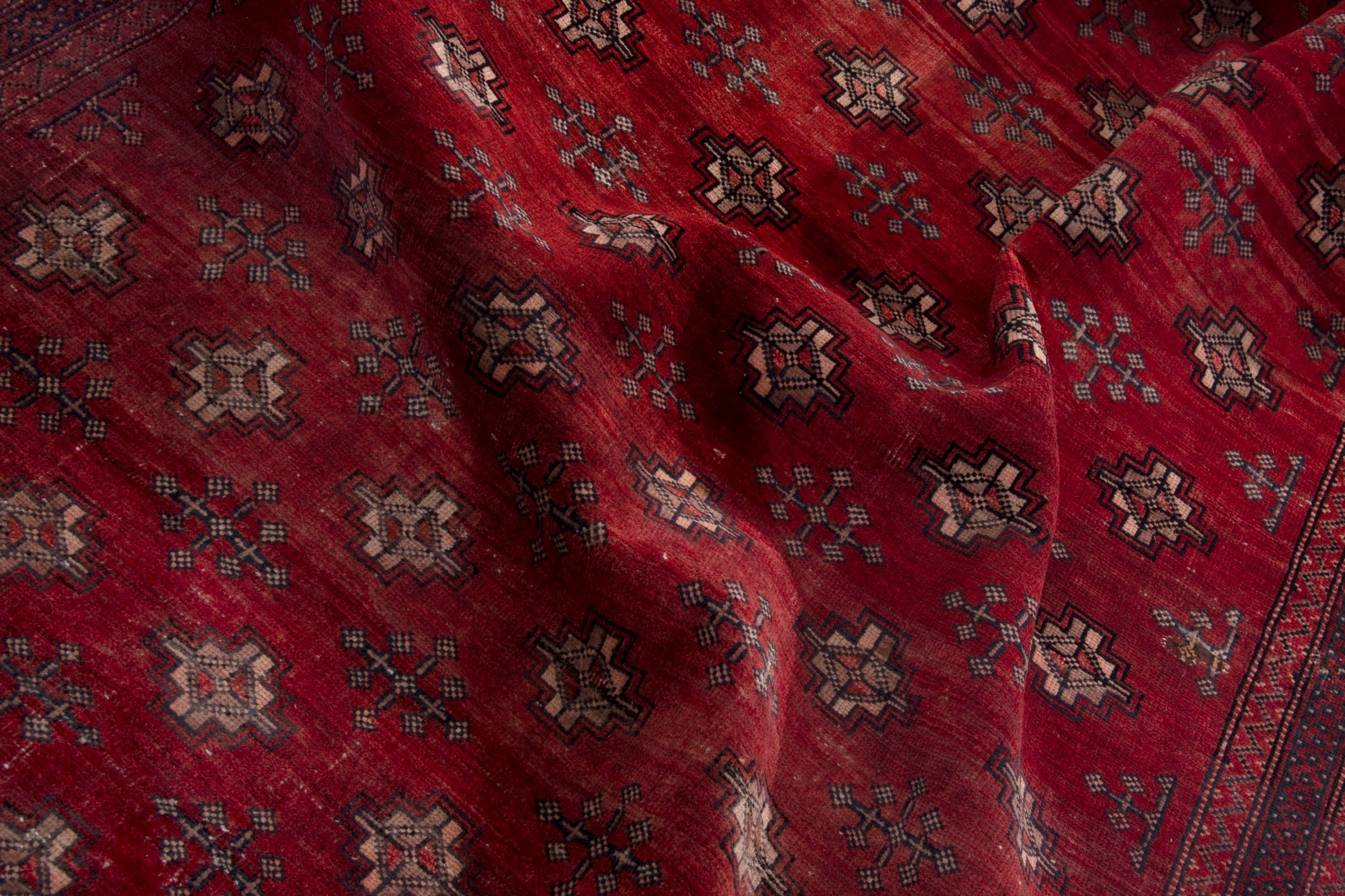 Persian Torkaman area rug in deep red and cream, view 16 of 17