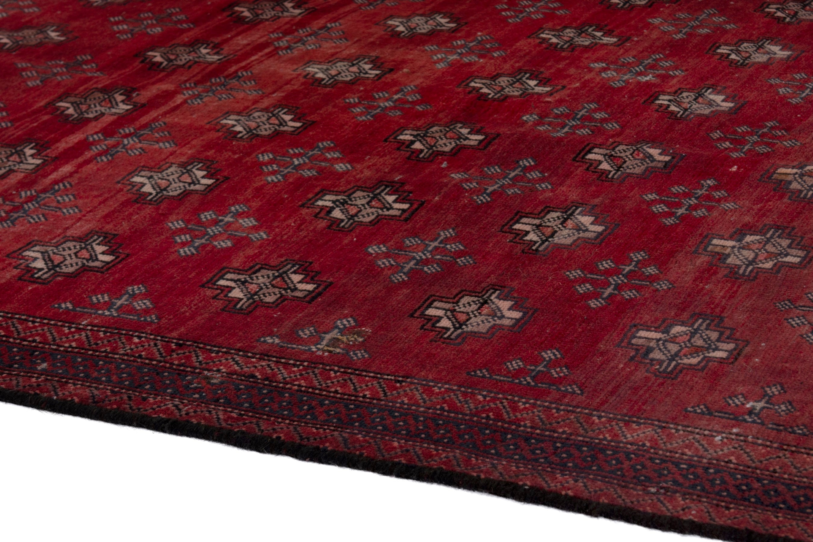 Persian Torkaman area rug in deep red and cream, view 6 of 17