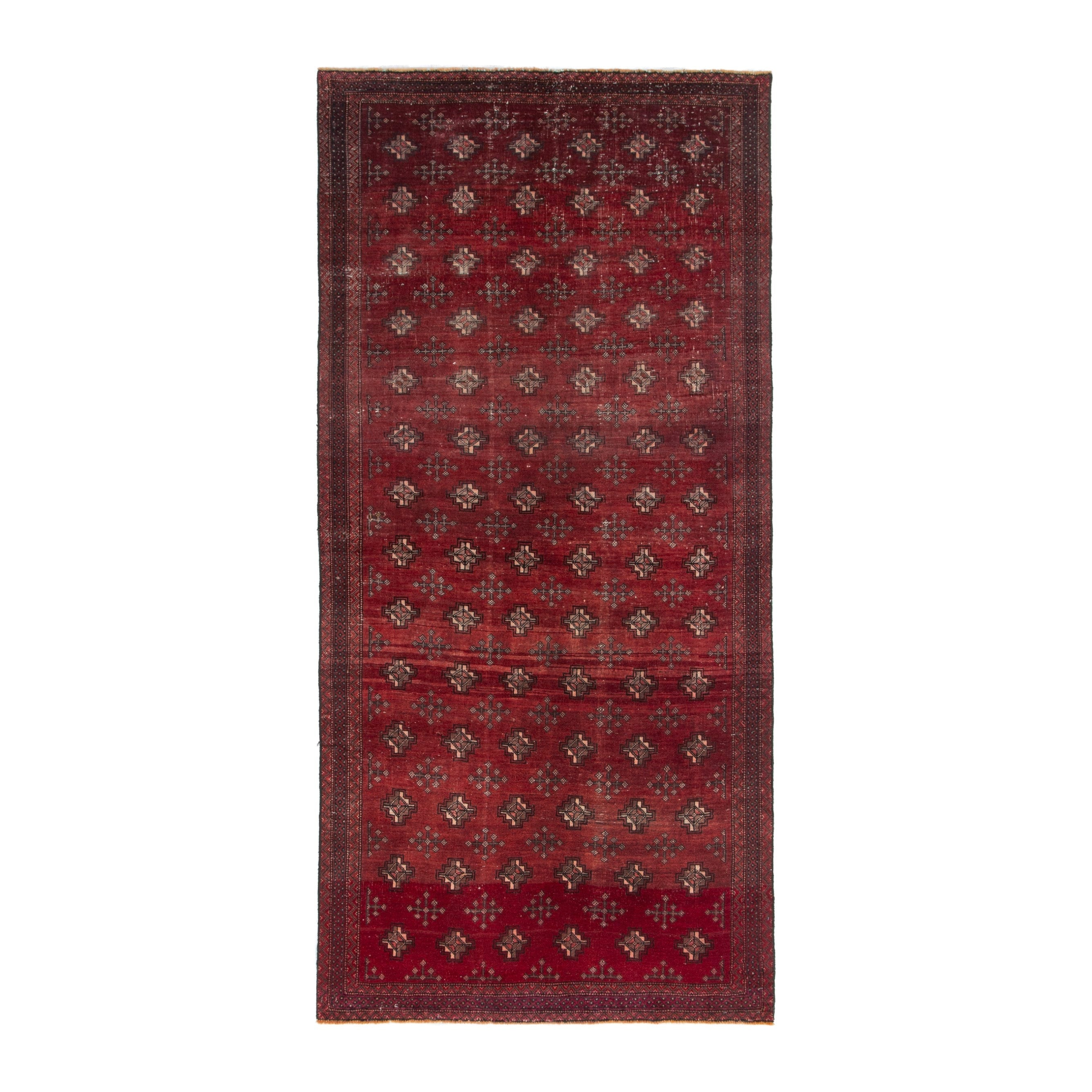 Persian Torkaman area rug in deep red and cream, 4'3" x 9'