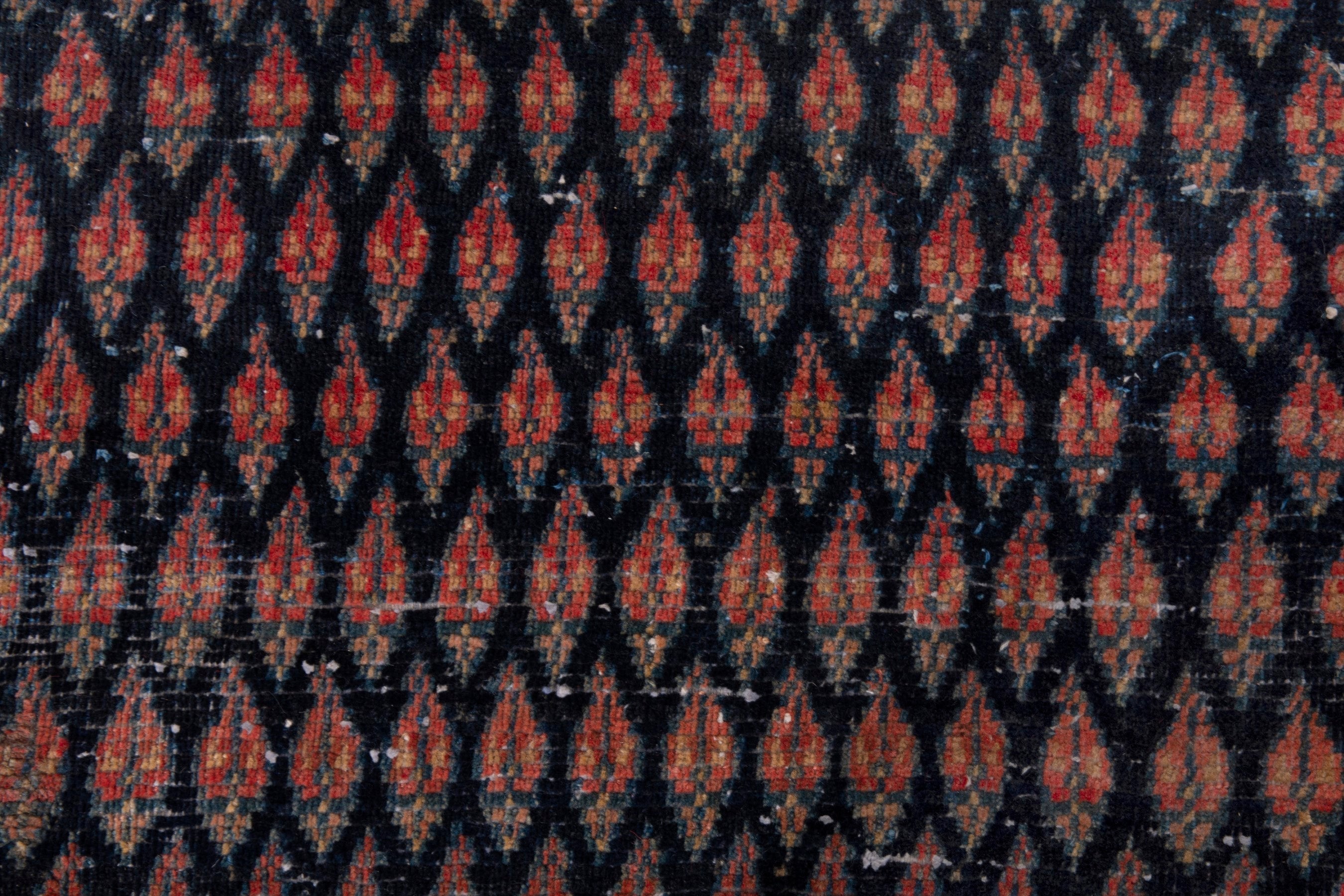 Persian Arak area rug in navy and burgundy, view 15 of 19