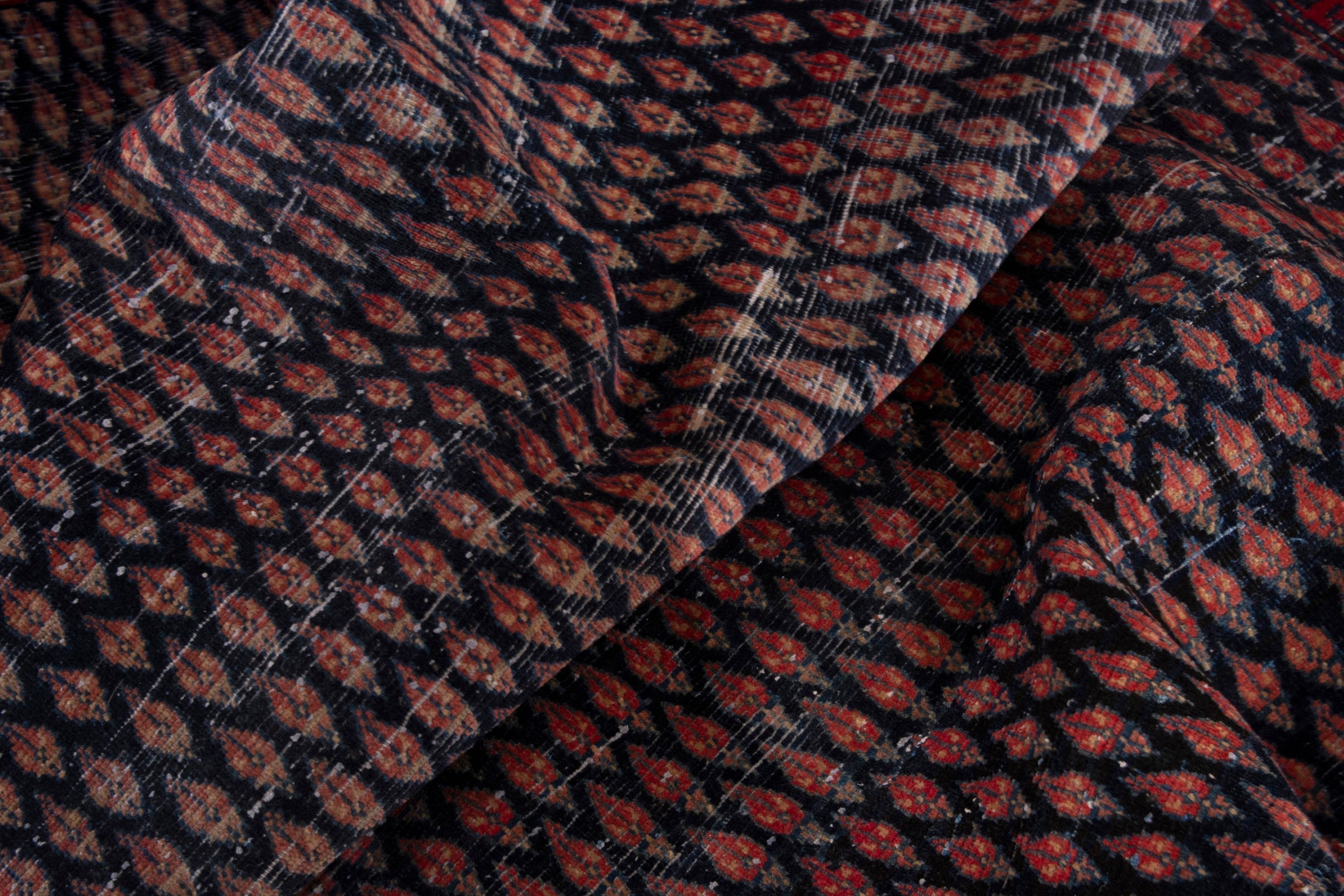 Persian Arak area rug in navy and burgundy, view 18 of 19