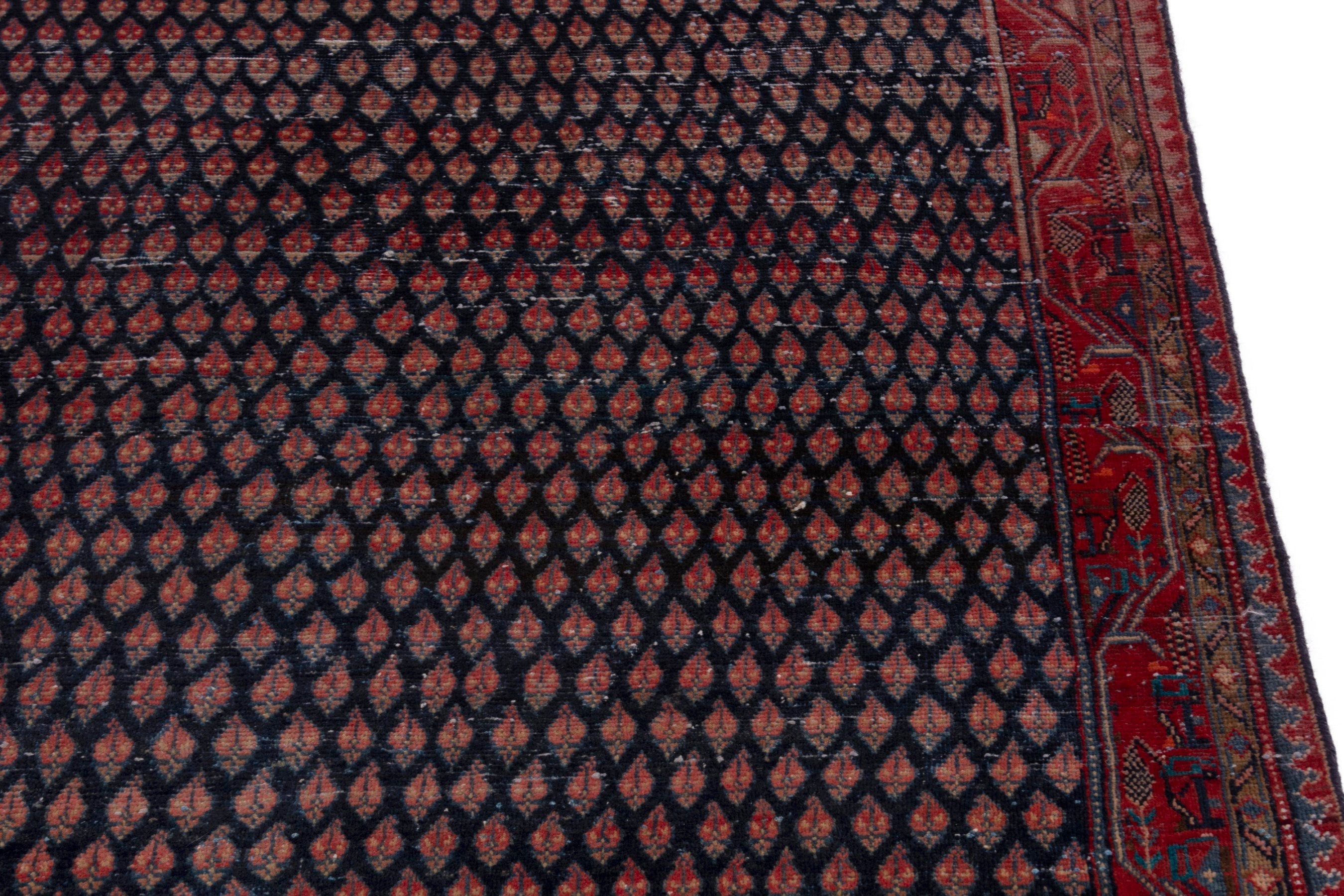 Persian Arak area rug in navy and burgundy, view 9 of 19