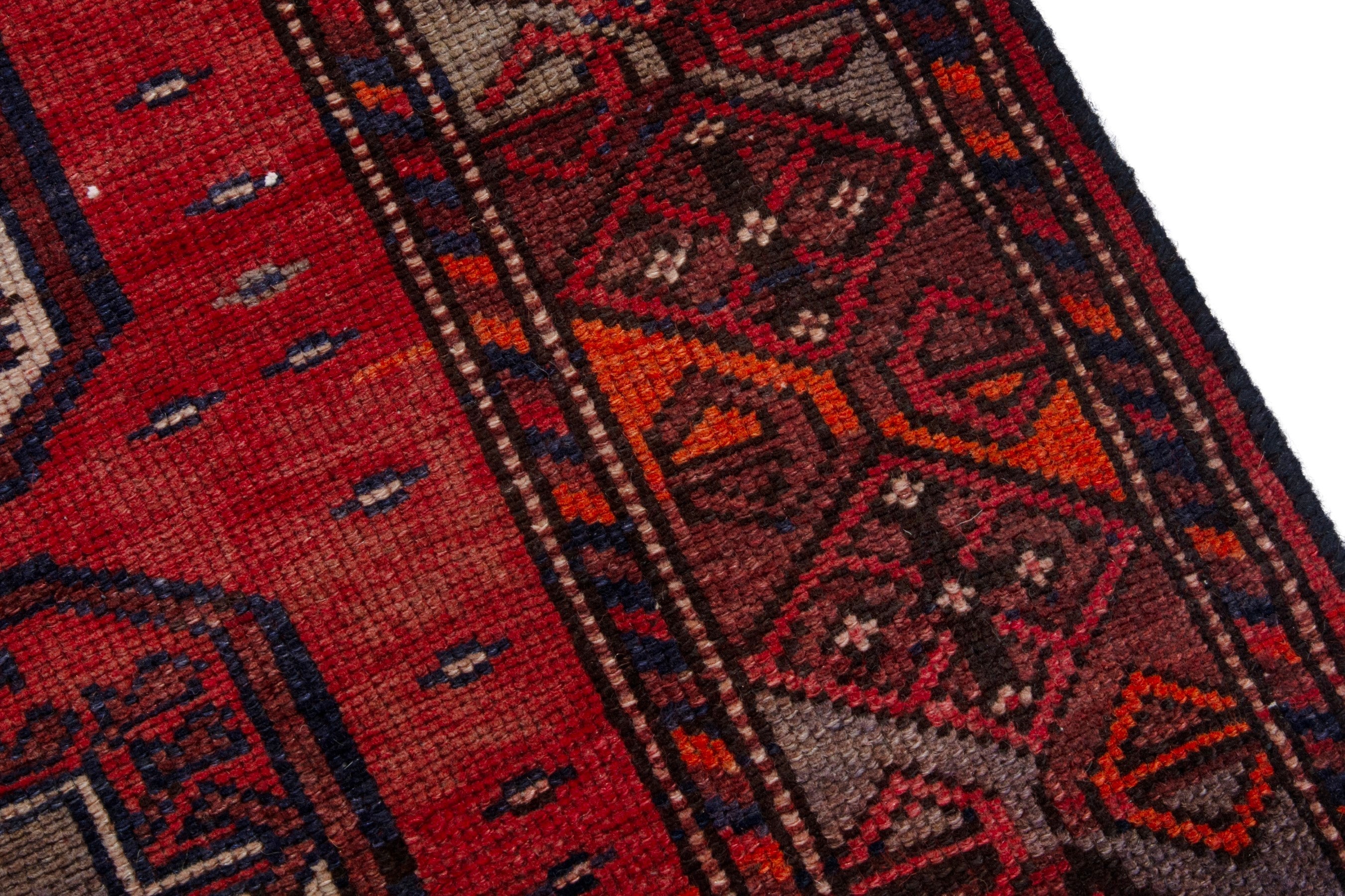 Persian Ghoochan area rug in deep red and burgundy, view 9 of 19