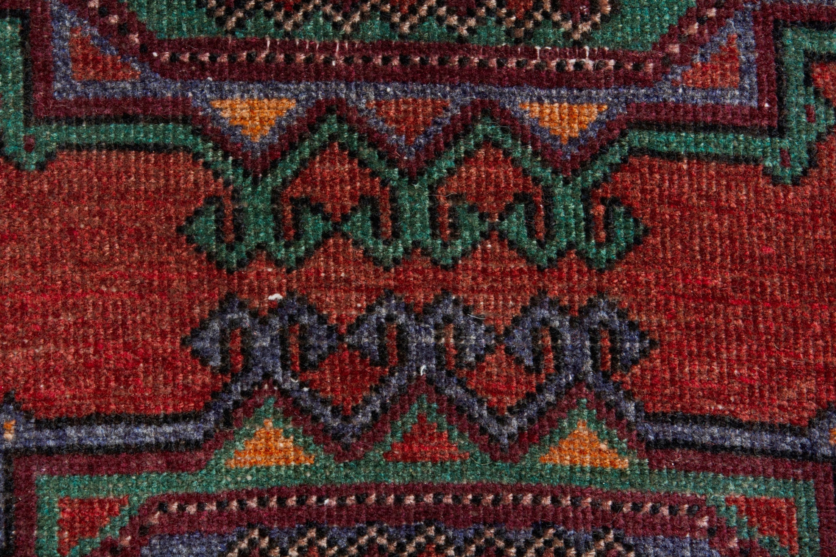 Persian Torkaman area rug in deep red and burgundy, view 11 of 18
