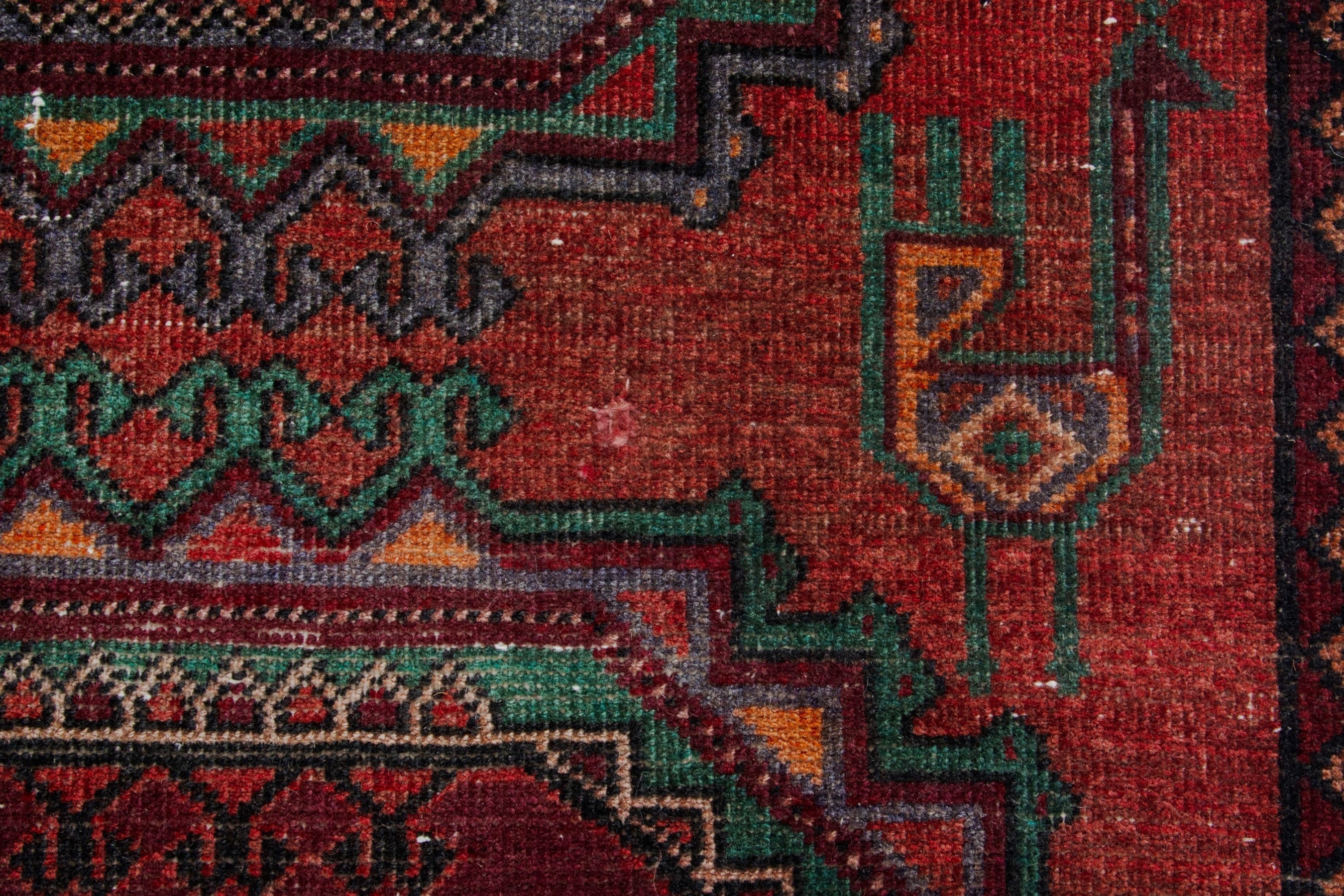 Persian Torkaman area rug in deep red and burgundy, view 12 of 18