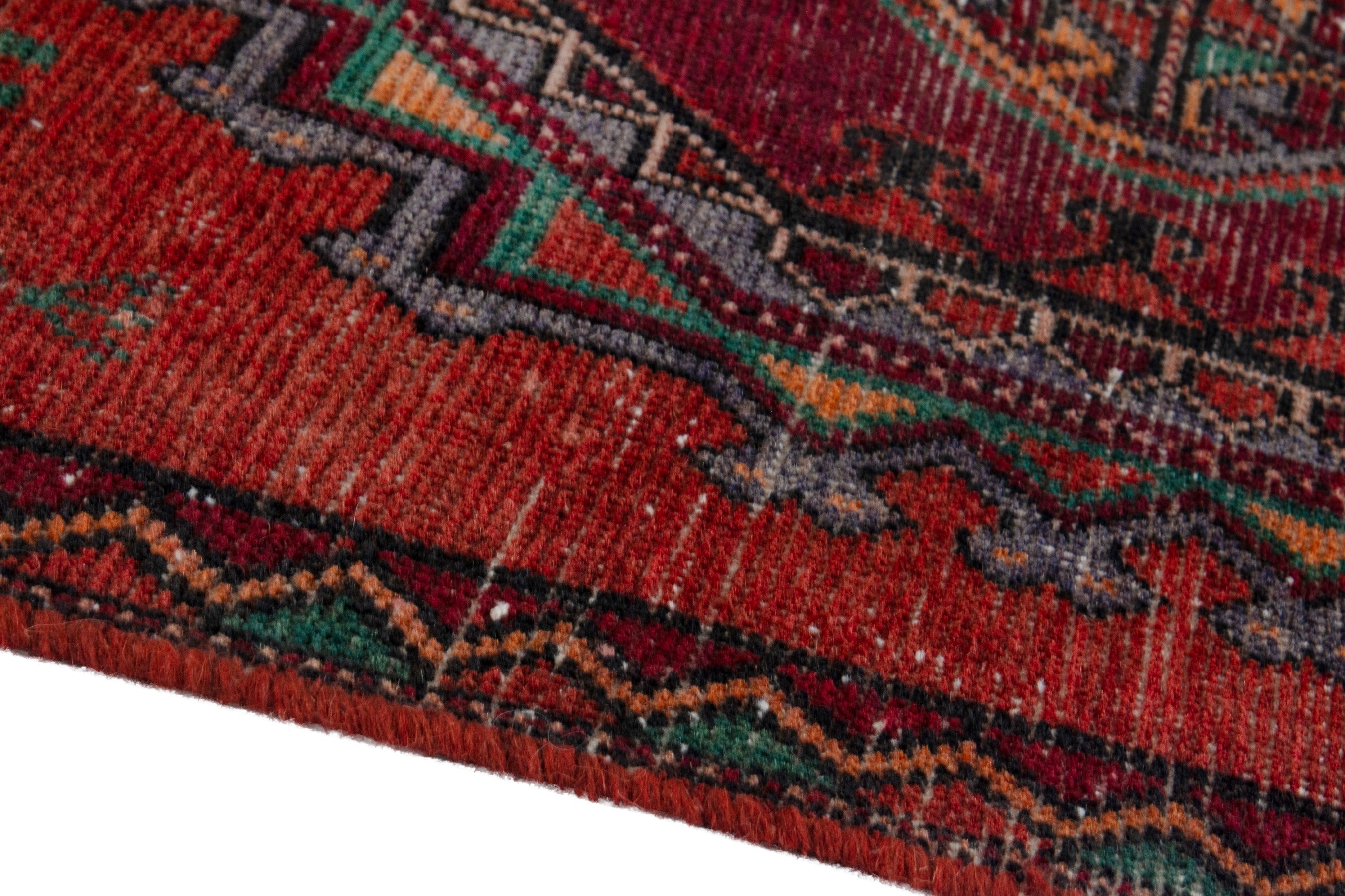 Persian Torkaman area rug in deep red and burgundy, view 6 of 18