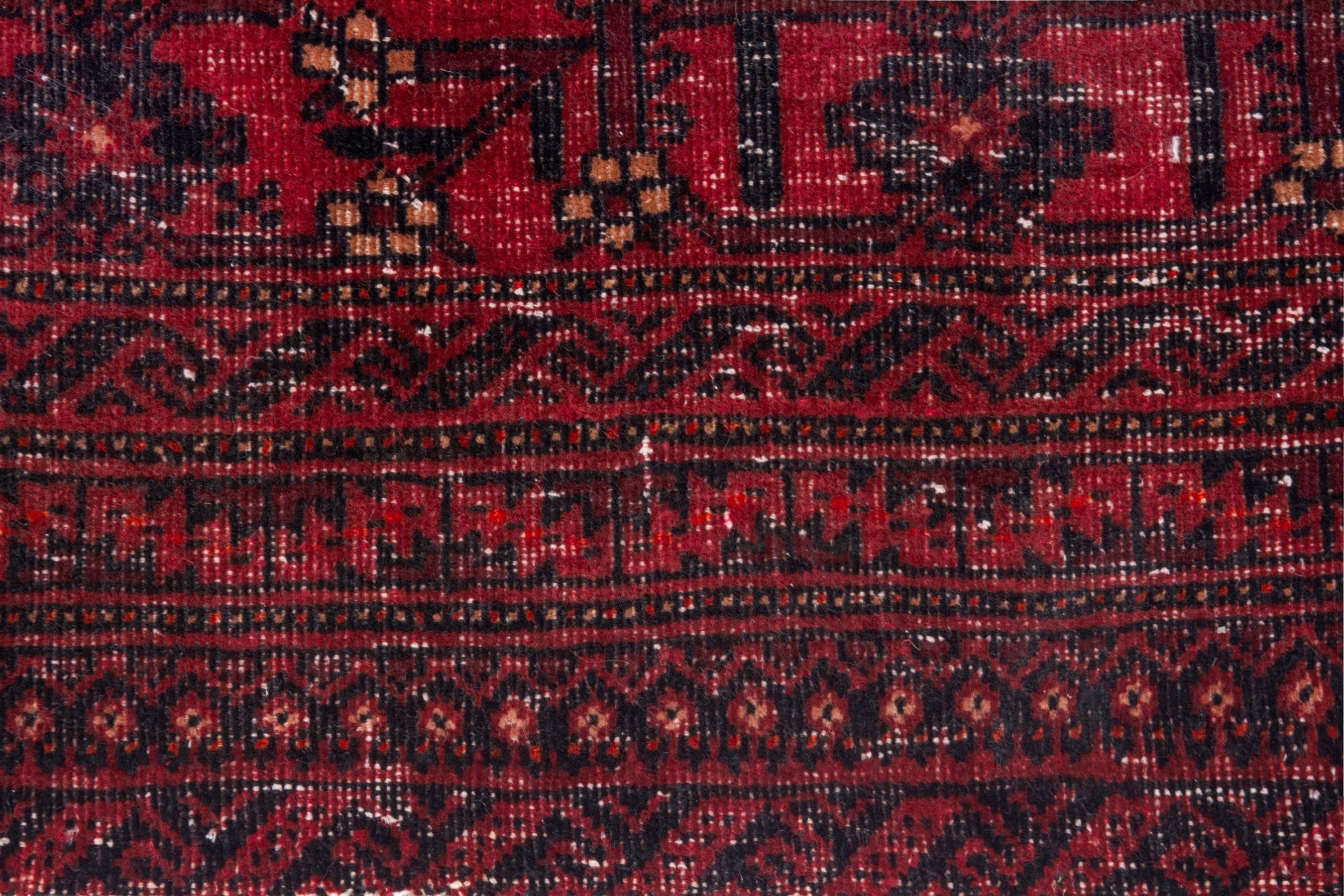 Persian Torkaman area rug in deep red and burgundy, view 11 of 20