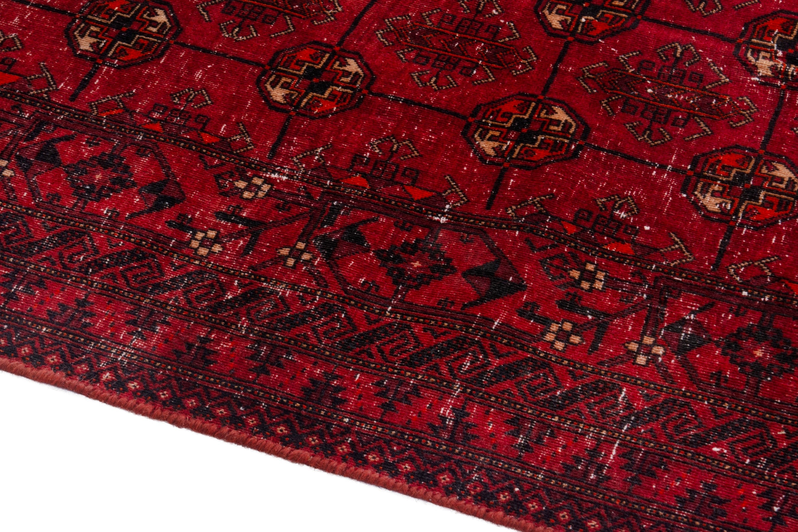 Persian Torkaman area rug in deep red and burgundy, view 6 of 20