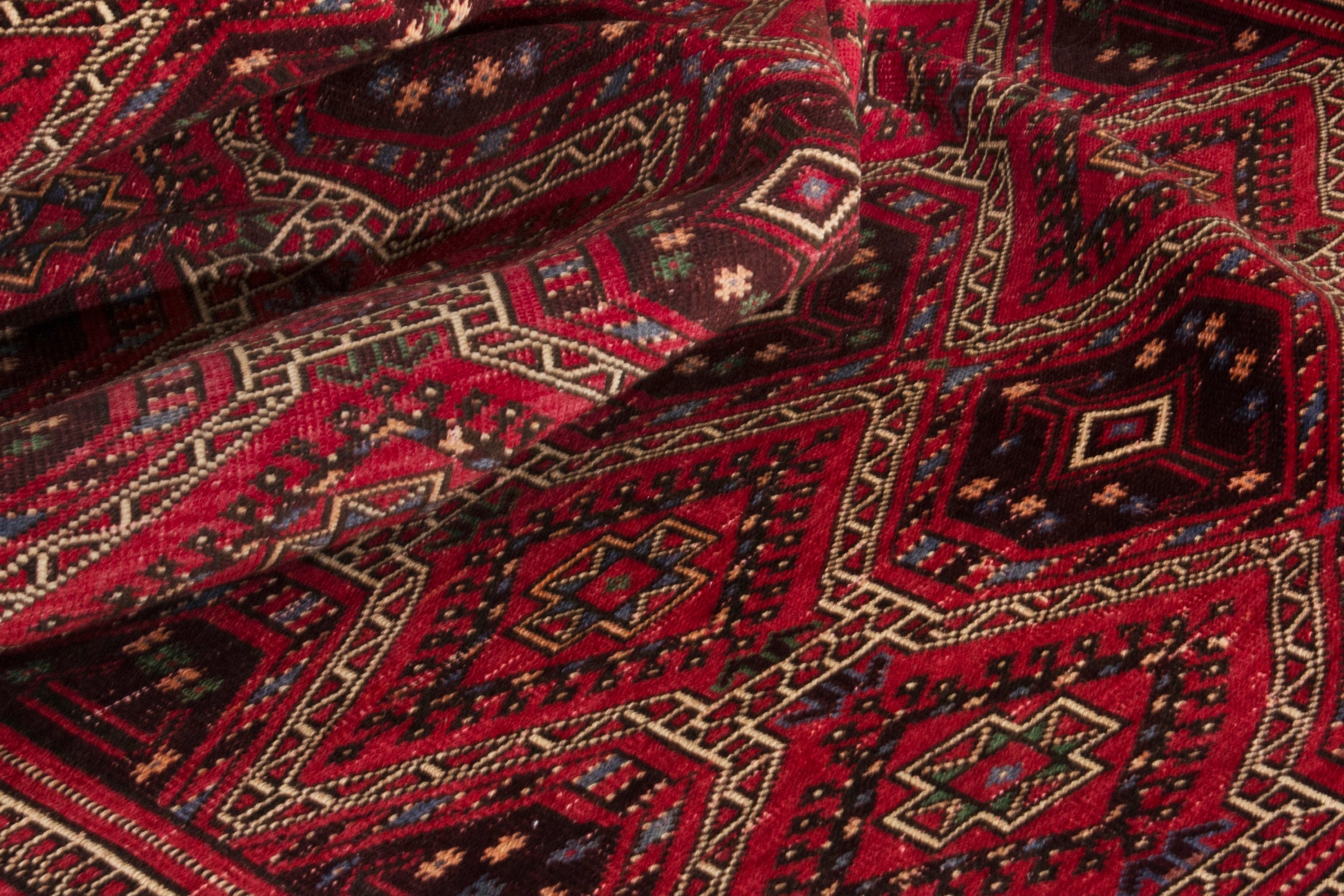 Persian Ghoochan runner rug in deep red and faded red, view 14 of 17