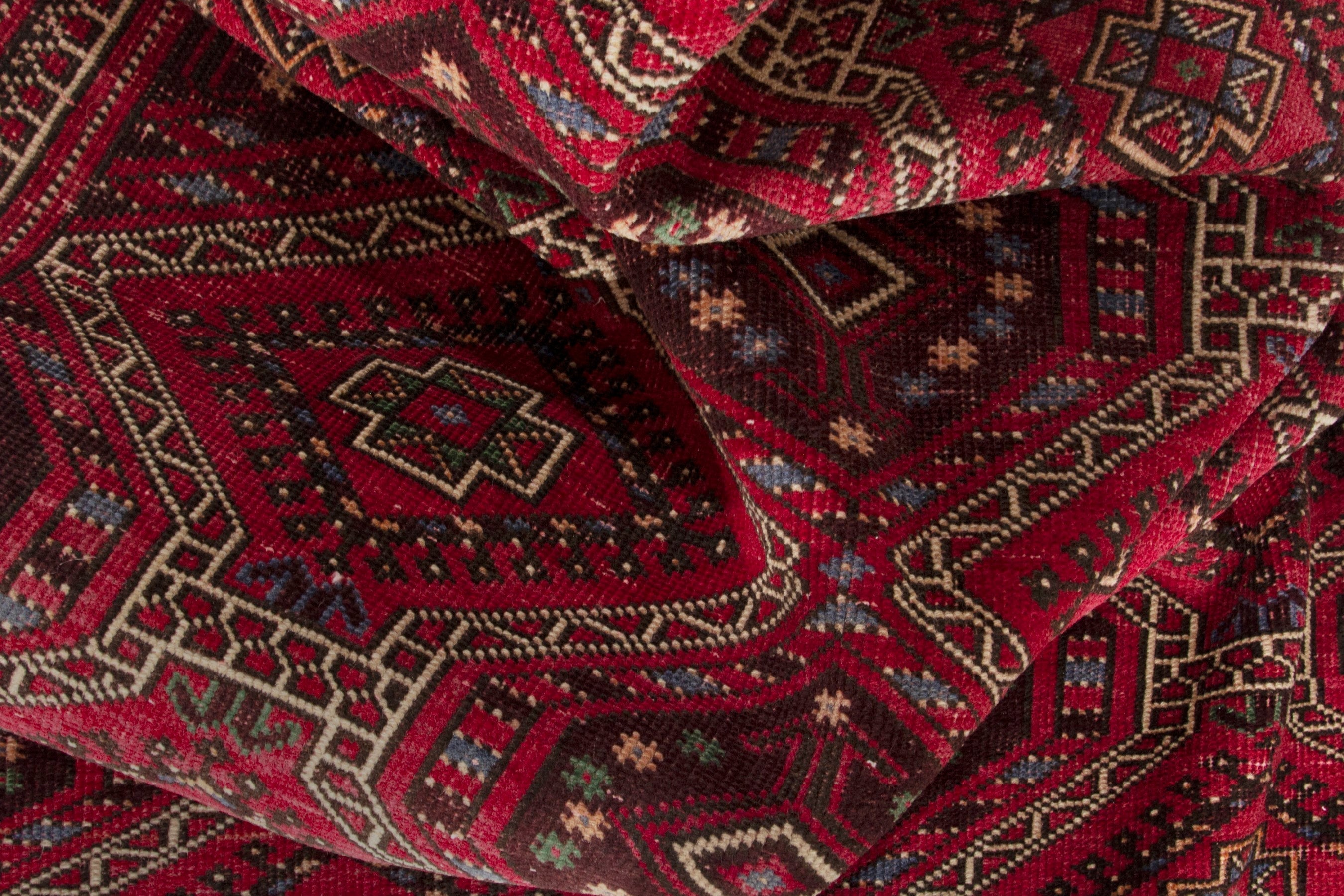Persian Ghoochan runner rug in deep red and faded red, view 15 of 17