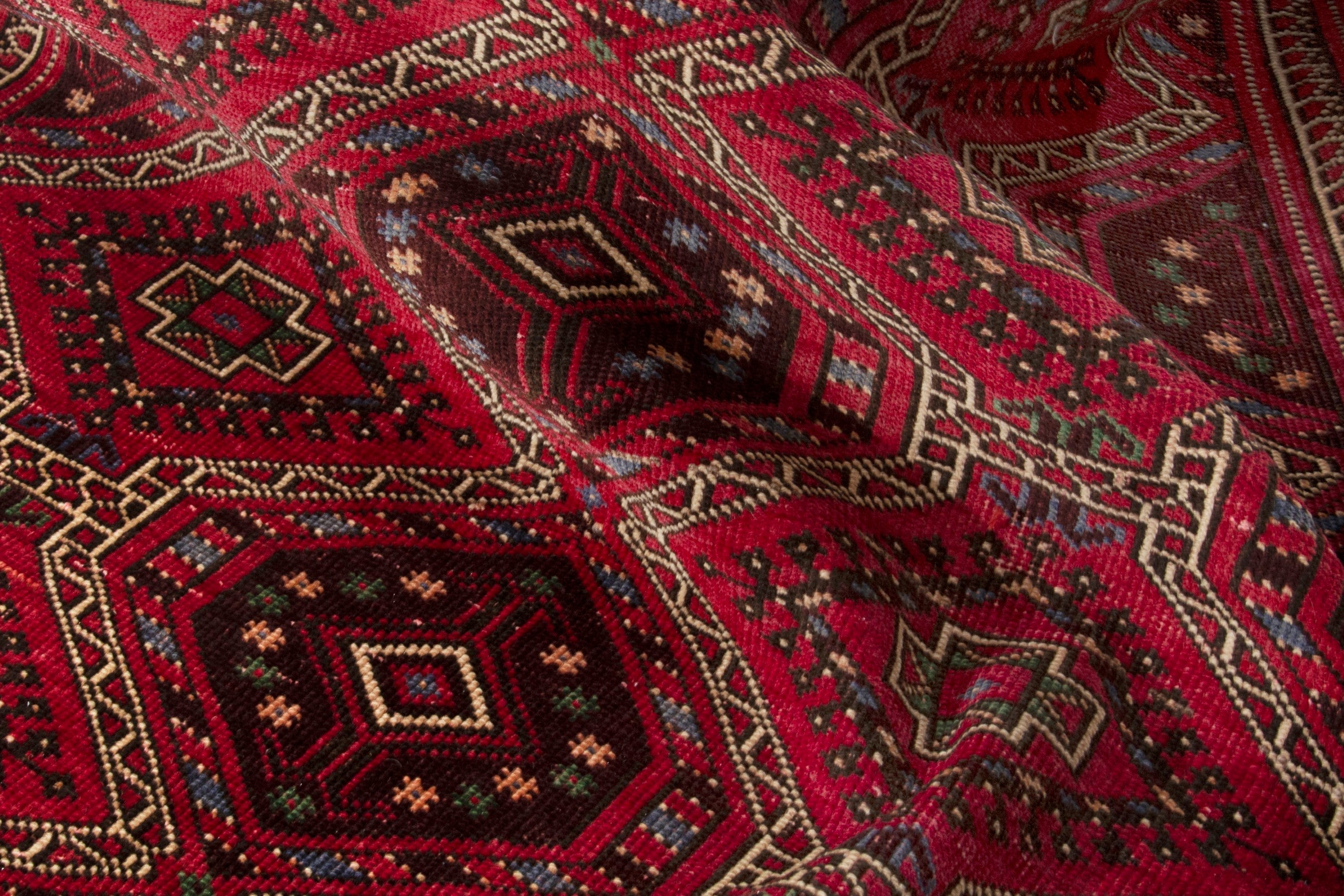 Persian Ghoochan runner rug in deep red and faded red, view 16 of 17