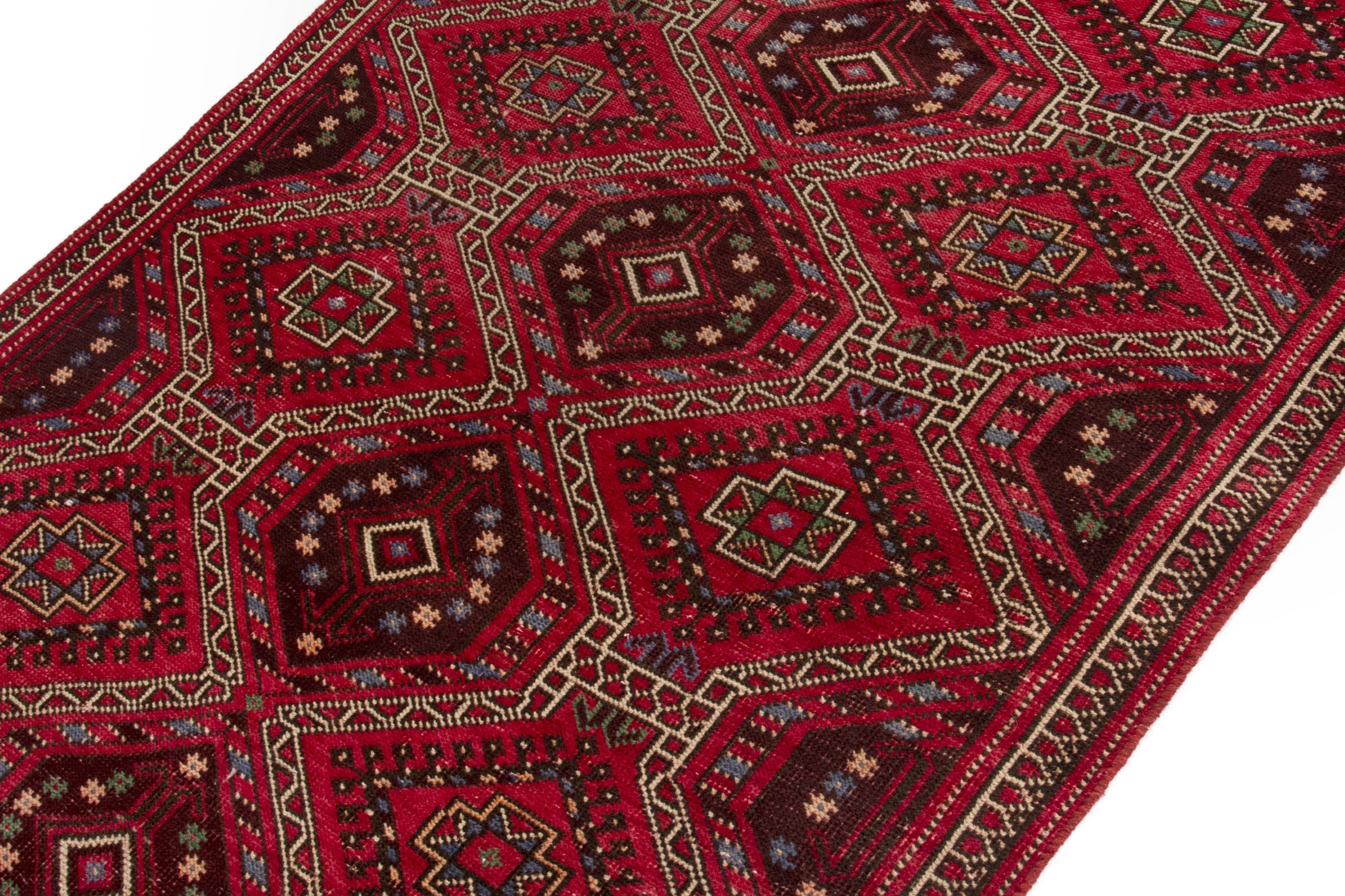 Persian Ghoochan runner rug in deep red and faded red, view 4 of 17
