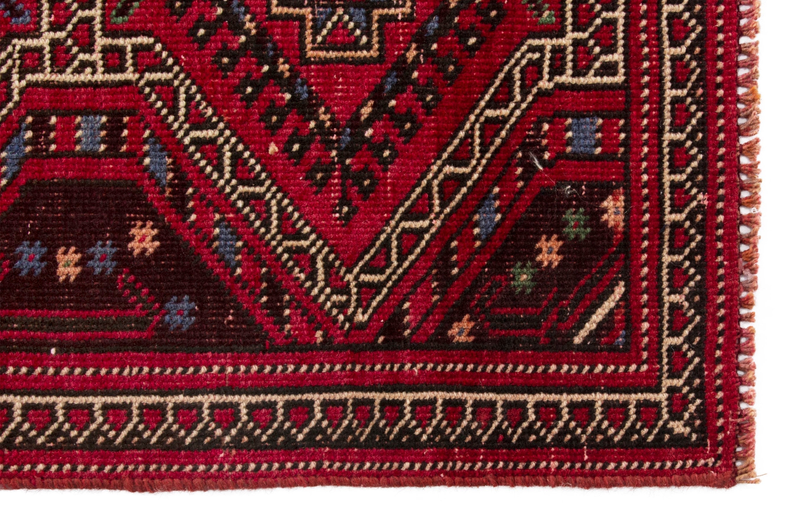 Persian Ghoochan runner rug in deep red and faded red, view 10 of 17