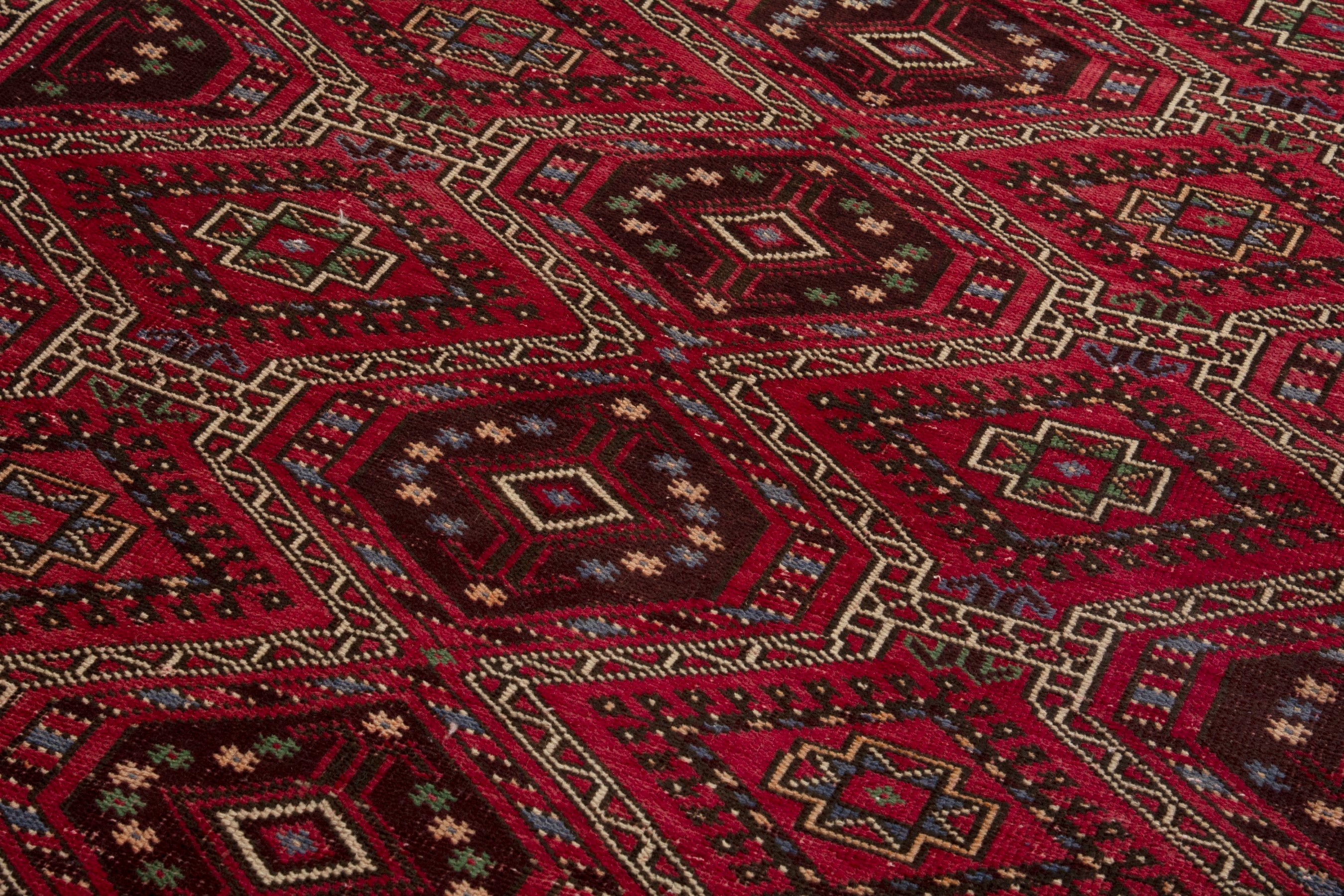 Persian Ghoochan runner rug in deep red and faded red, view 7 of 17