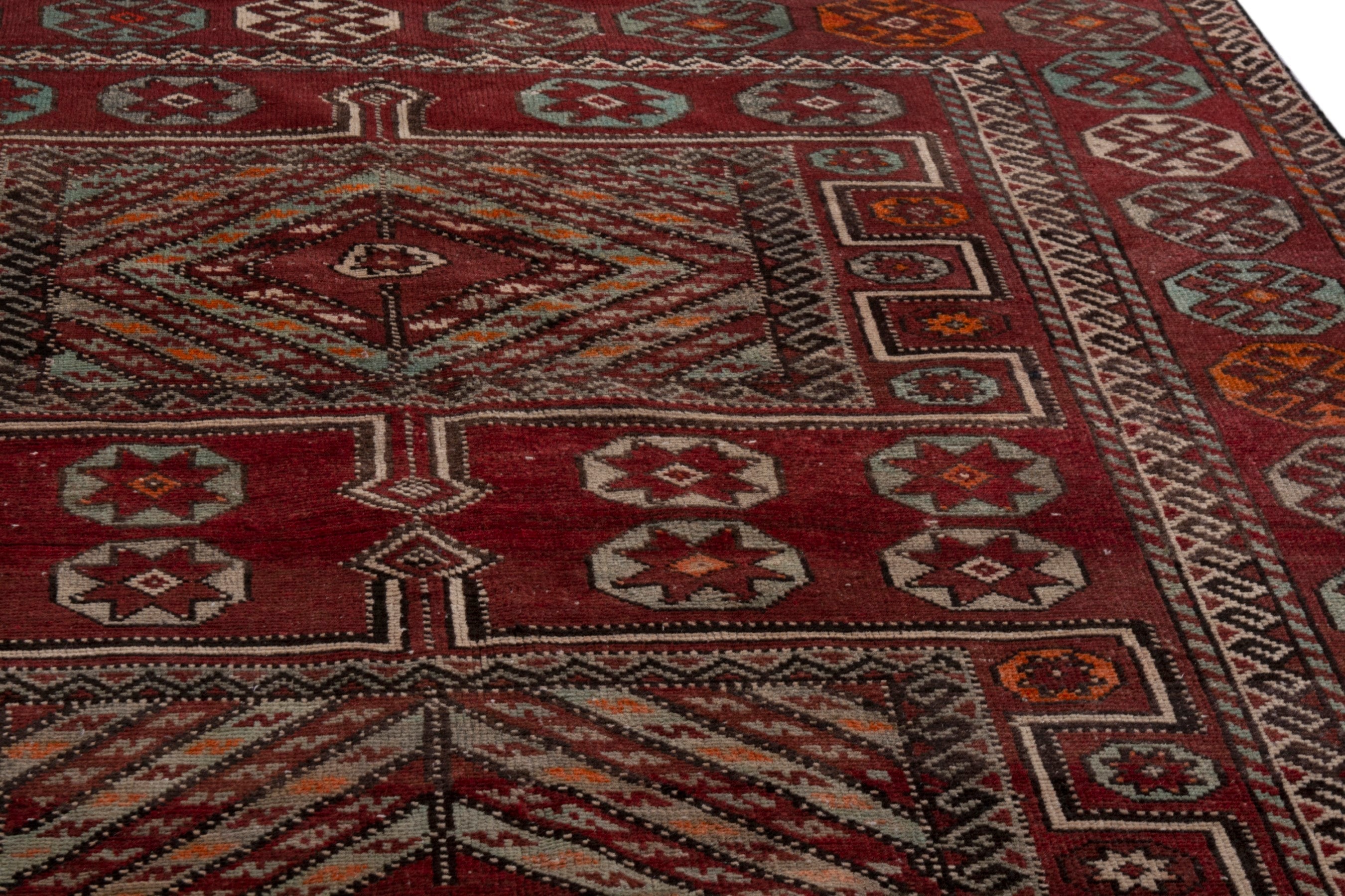 Persian Ghoochan area rug in deep red and burgundy, view 8 of 18