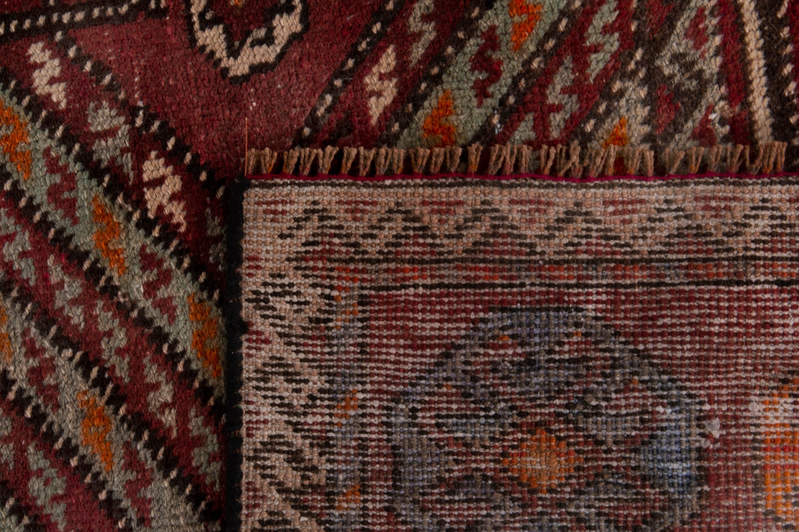 Persian Ghoochan area rug in deep red and burgundy, view 18 of 18
