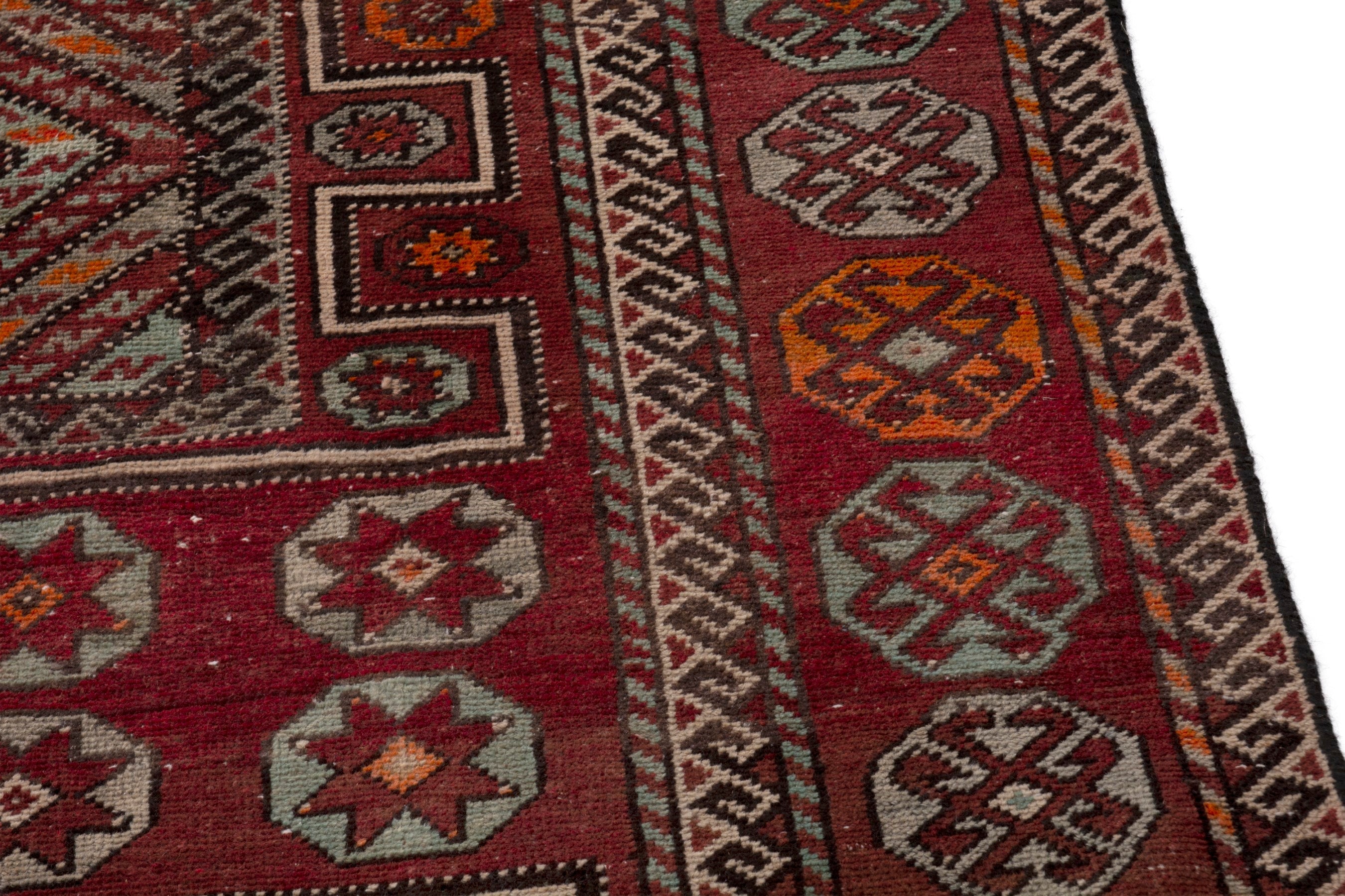 Persian Ghoochan area rug in deep red and burgundy, view 9 of 18