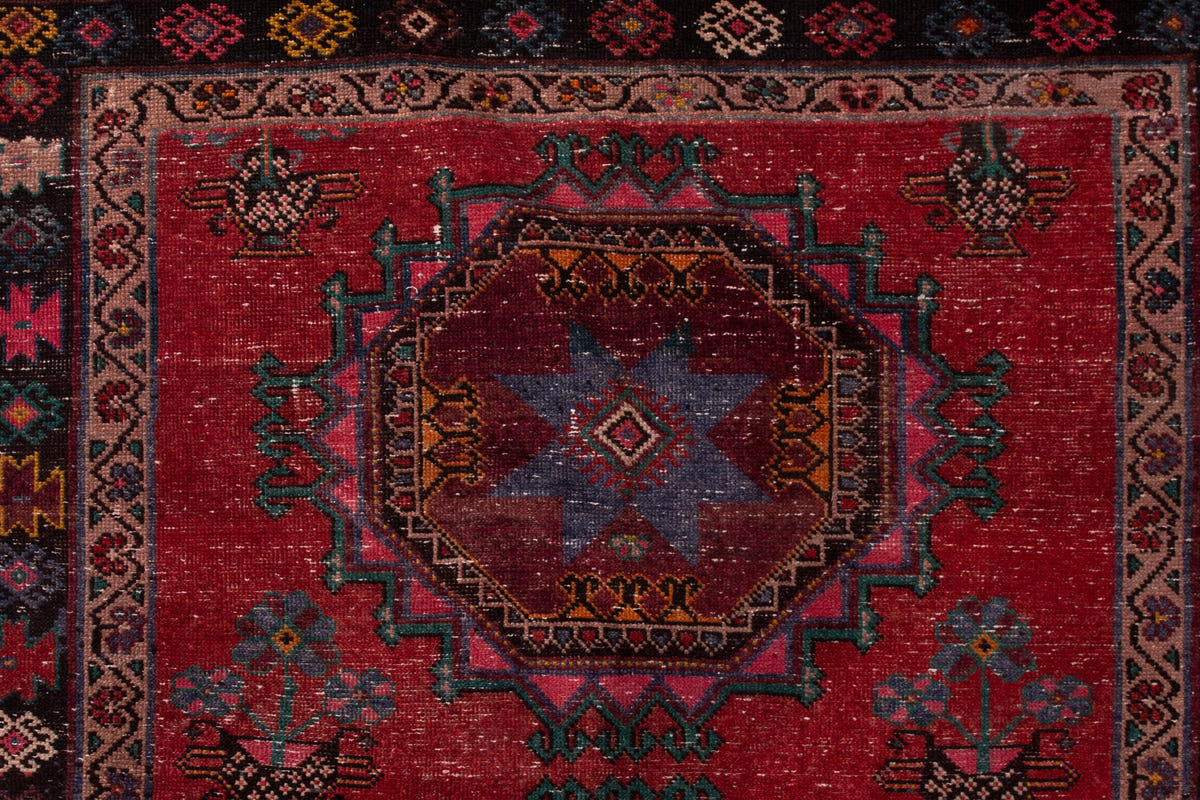 Persian Ghoochan area rug in faded red and black, view 15 of 21