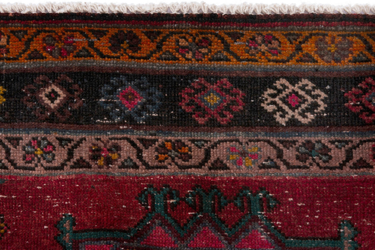 Persian Ghoochan area rug in faded red and black, view 17 of 21