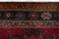 Persian Ghoochan area rug in faded red and black, view 17 of 21