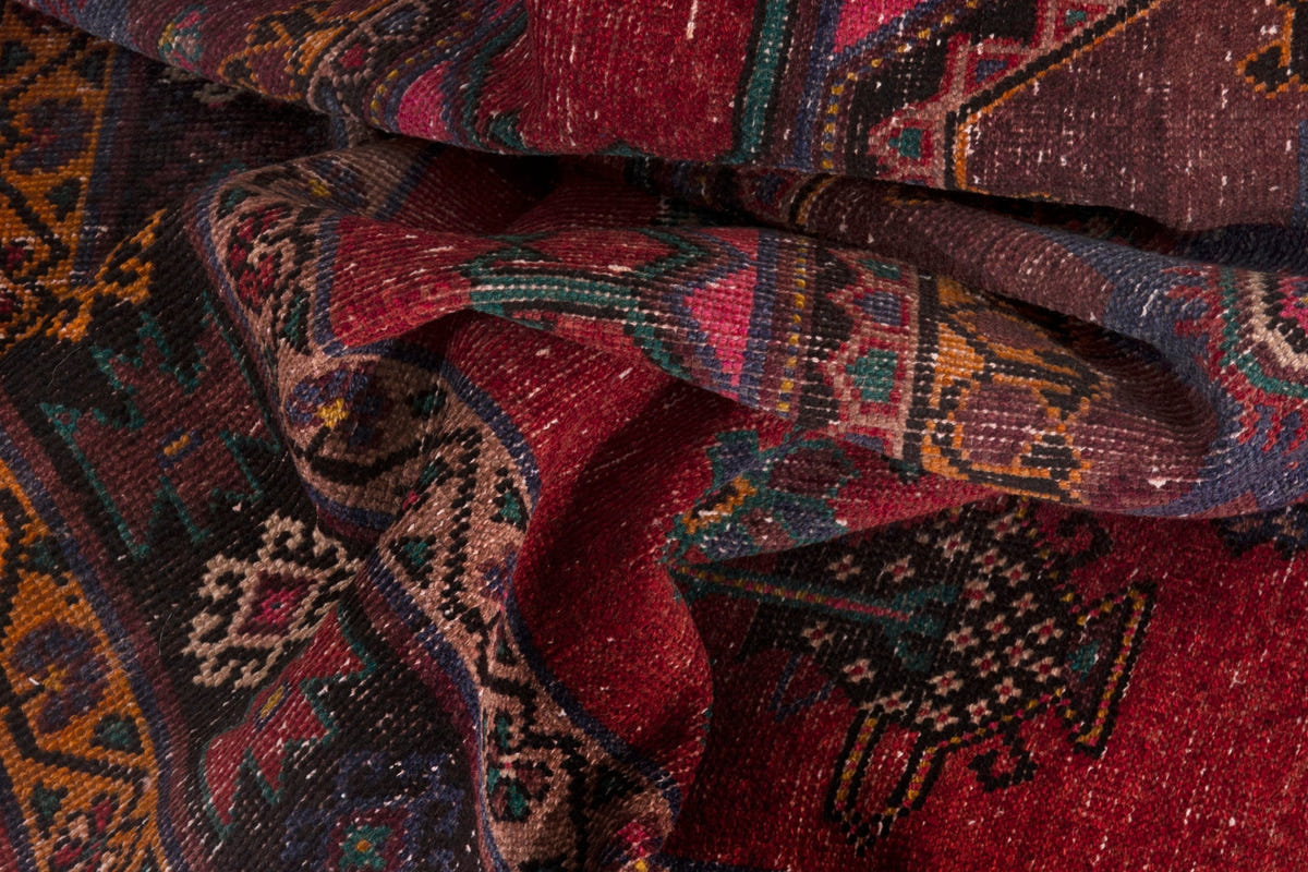 Persian Ghoochan area rug in faded red and black, view 18 of 21