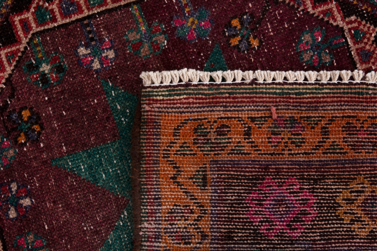 Persian Ghoochan area rug in faded red and black, view 21 of 21