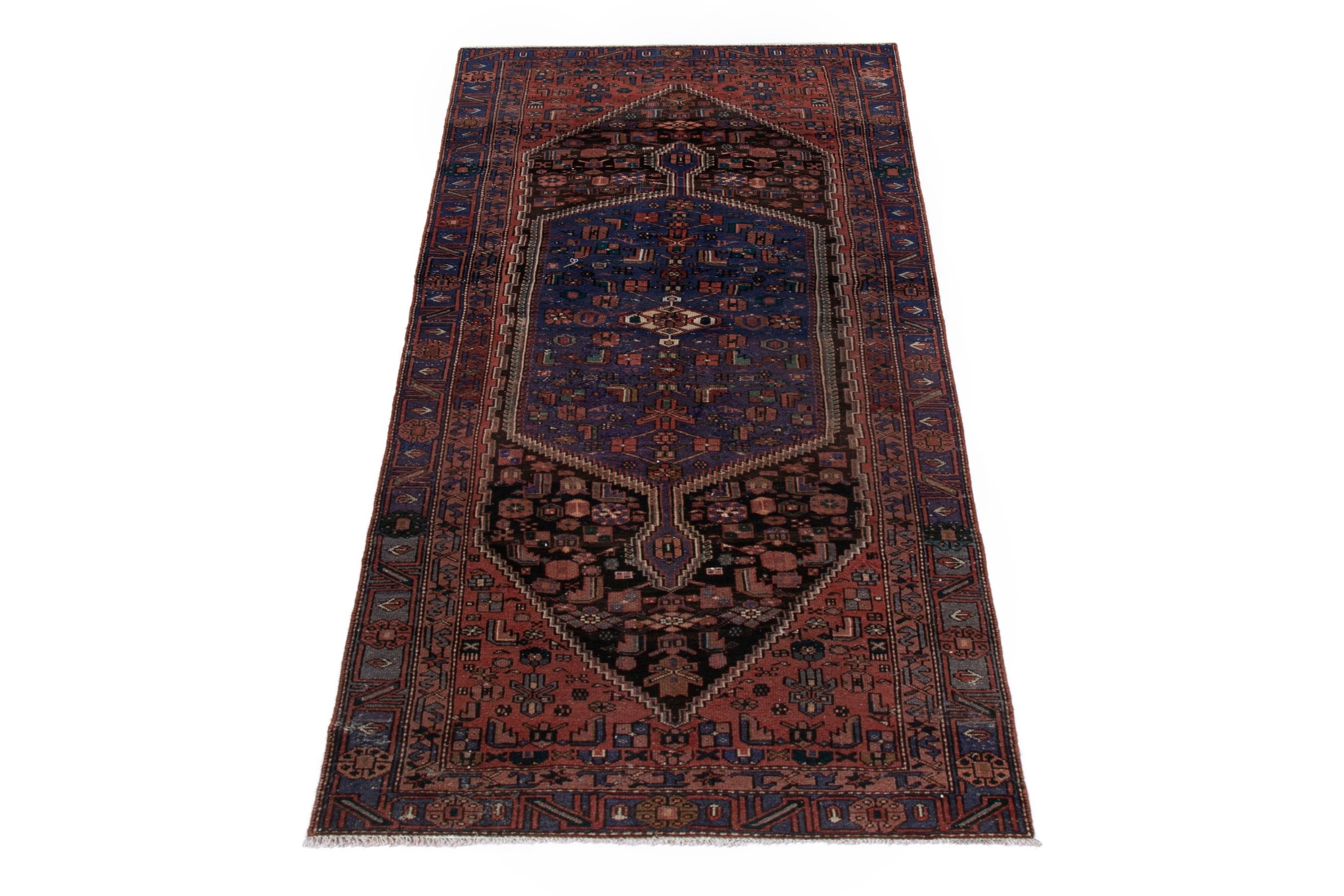 Persian Zanjan area rug in rust and dark blue, view 2 of 19
