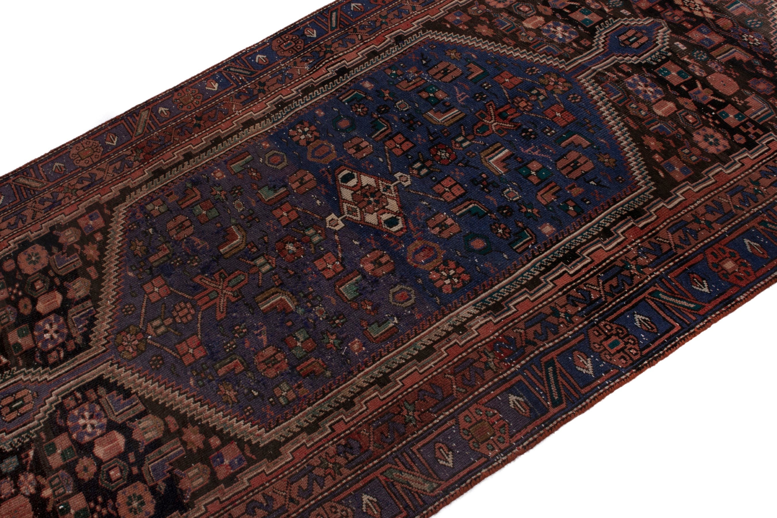 Persian Zanjan area rug in rust and dark blue, view 4 of 19