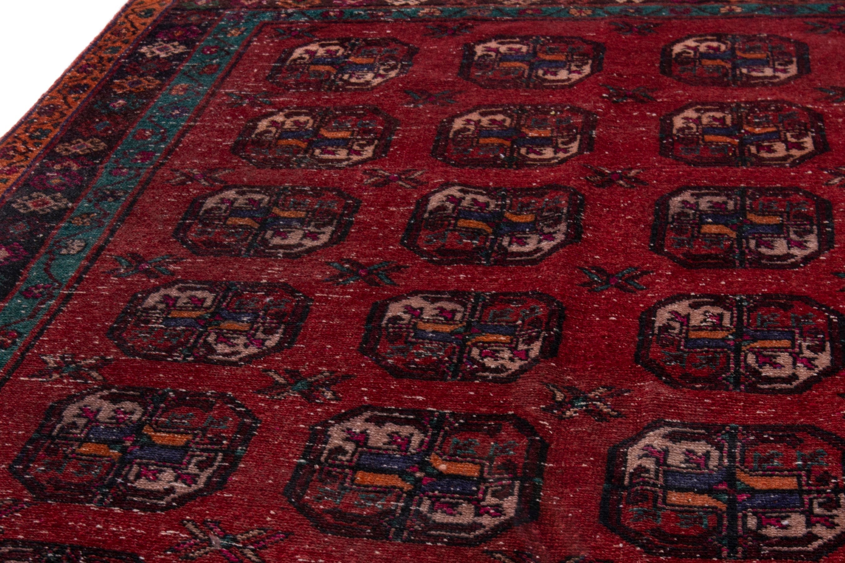 Persian Ghoochan area rug in deep red and dark brown, view 8 of 18