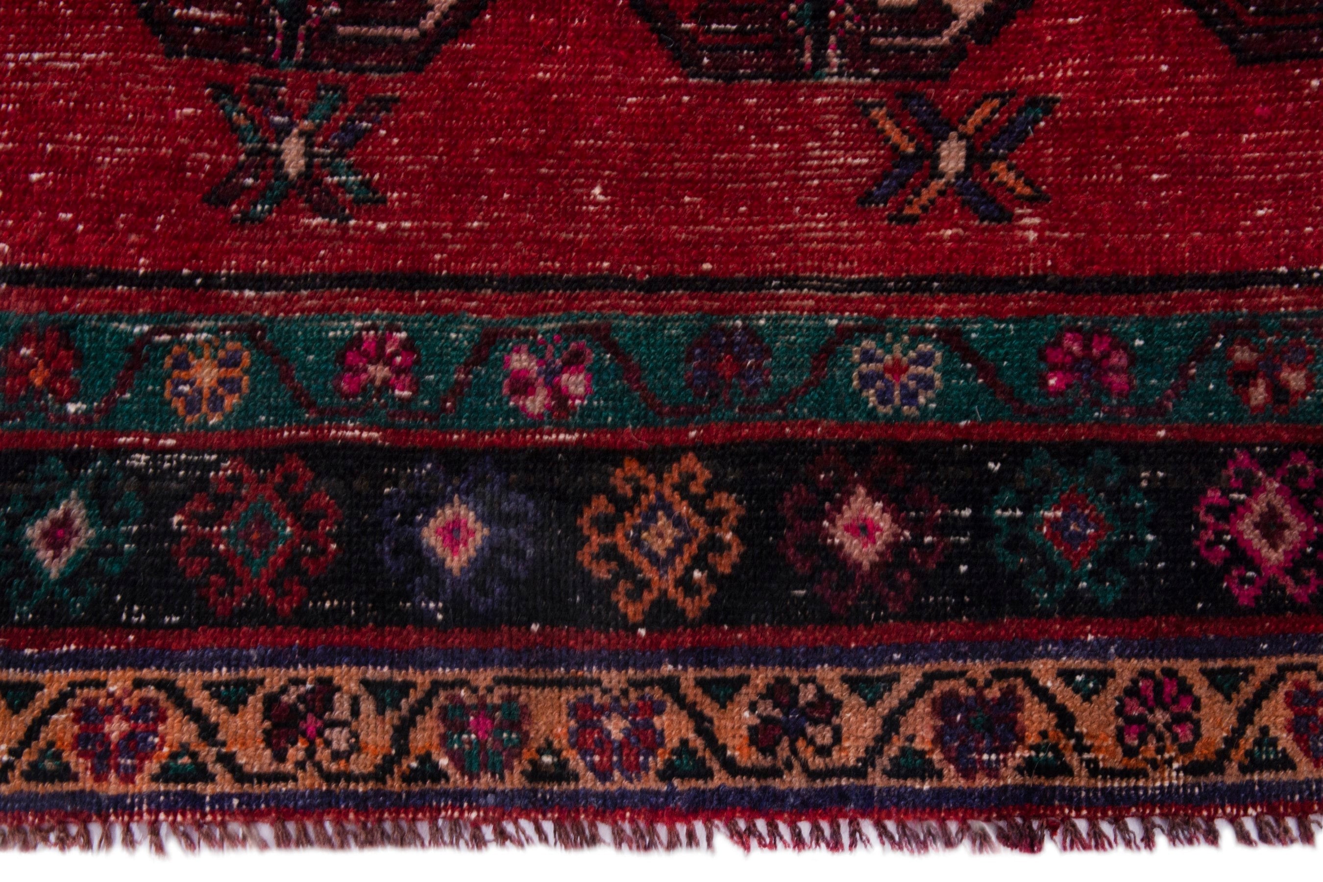 Persian Ghoochan area rug in deep red and dark brown, view 11 of 18