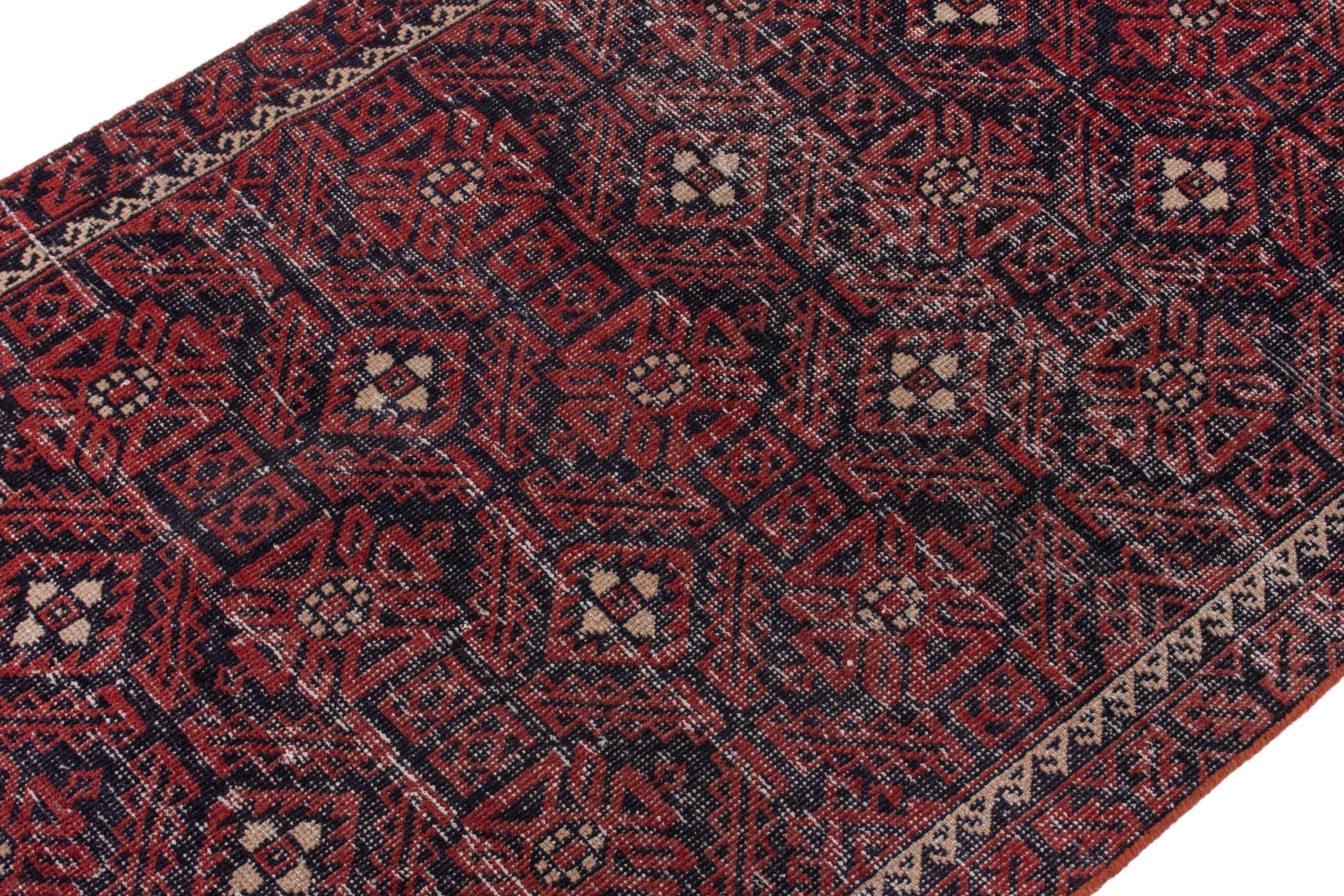 Persian Baluch runner rug in burgundy and cream, view 4 of 17