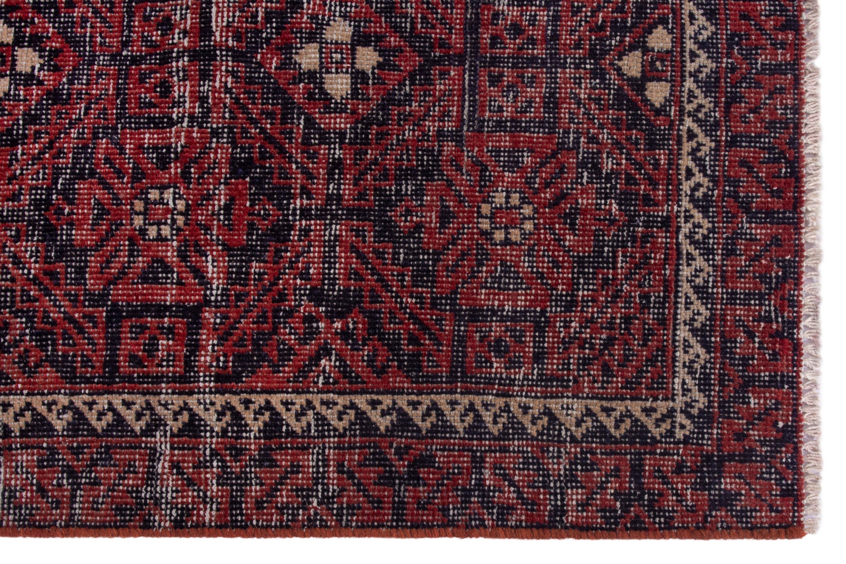Persian Baluch runner rug in burgundy and cream, view 10 of 17