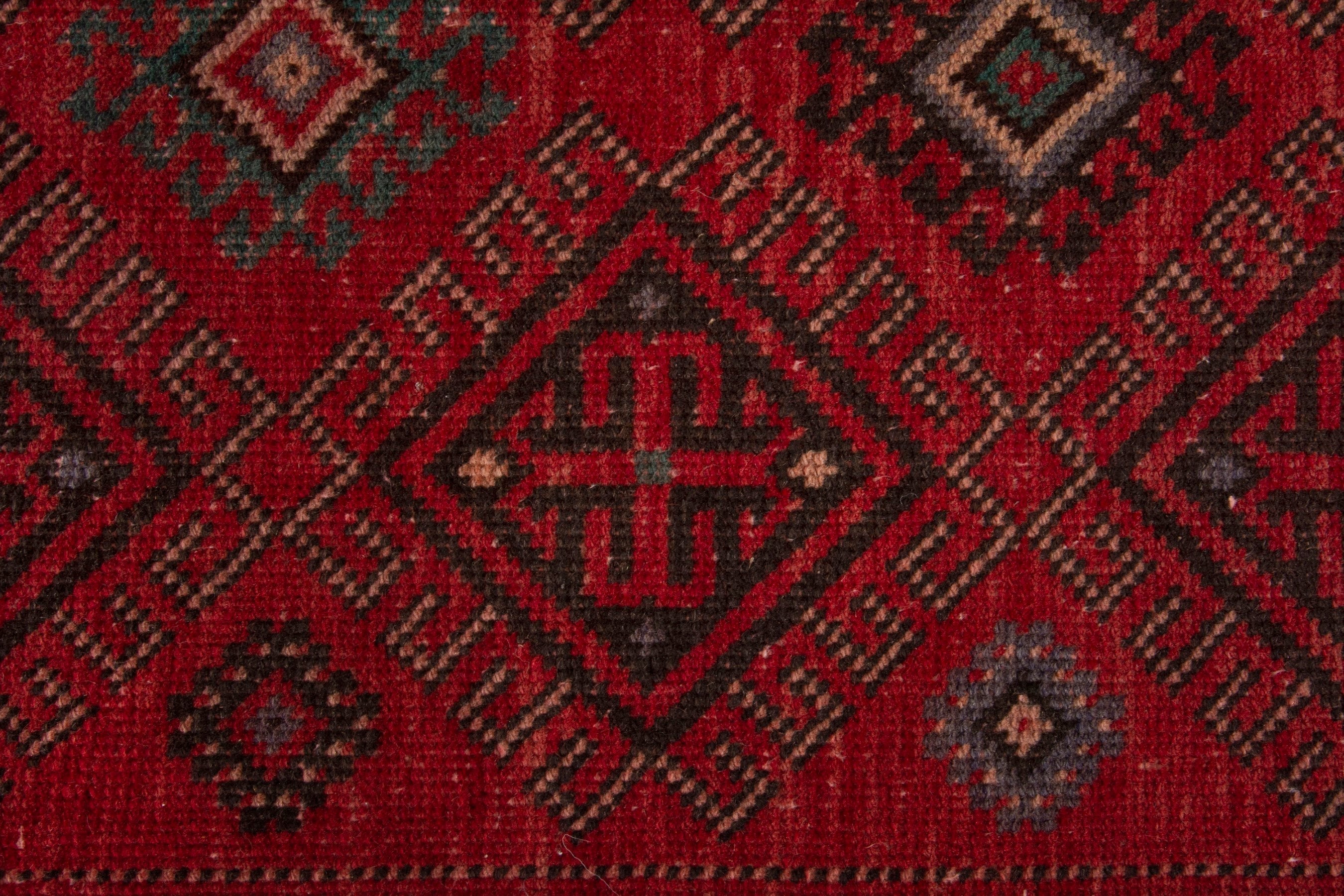 Persian Ghoochan runner rug in deep red and burgundy, view 11 of 17