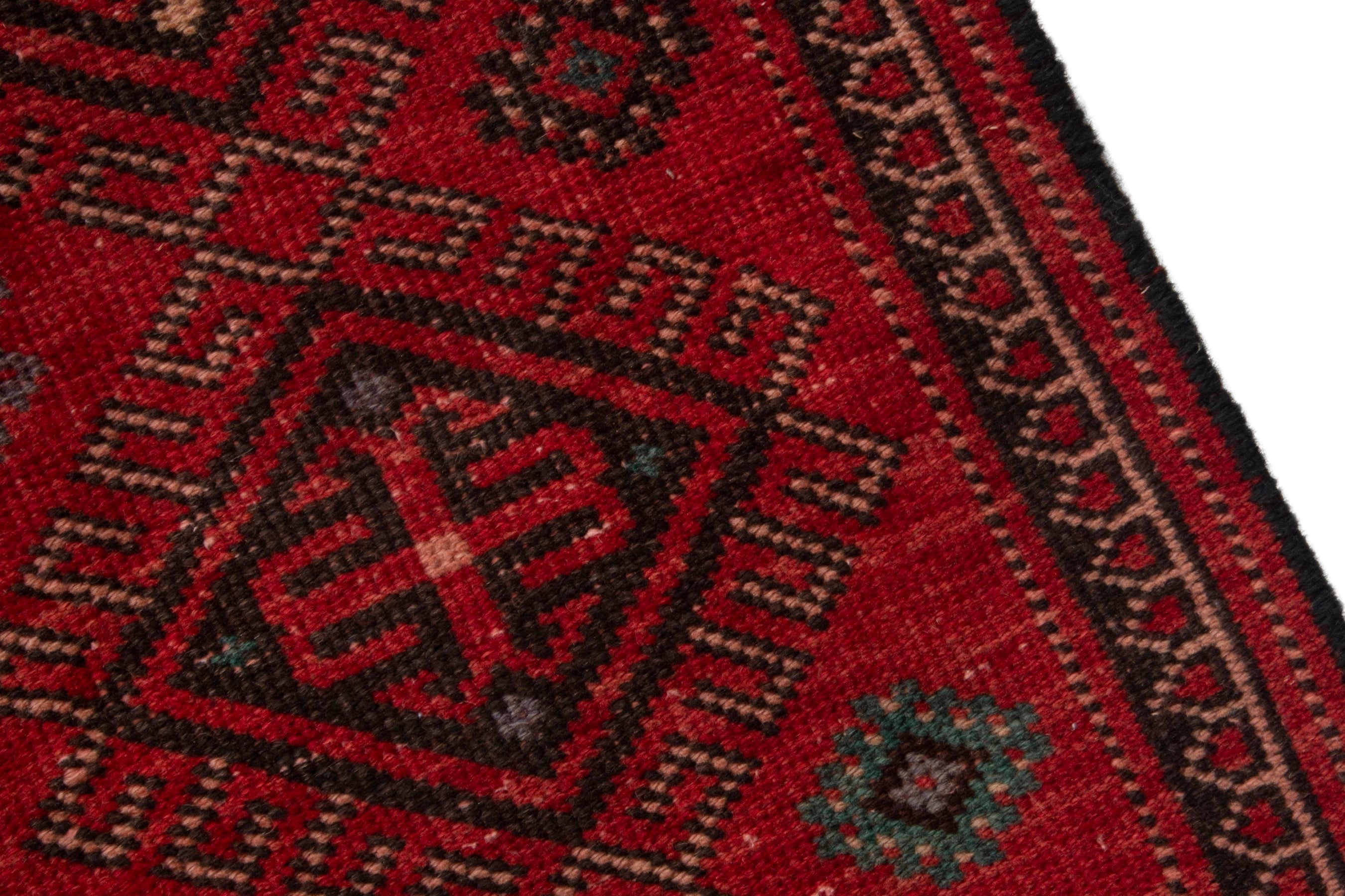 Persian Ghoochan runner rug in deep red and burgundy, view 9 of 17