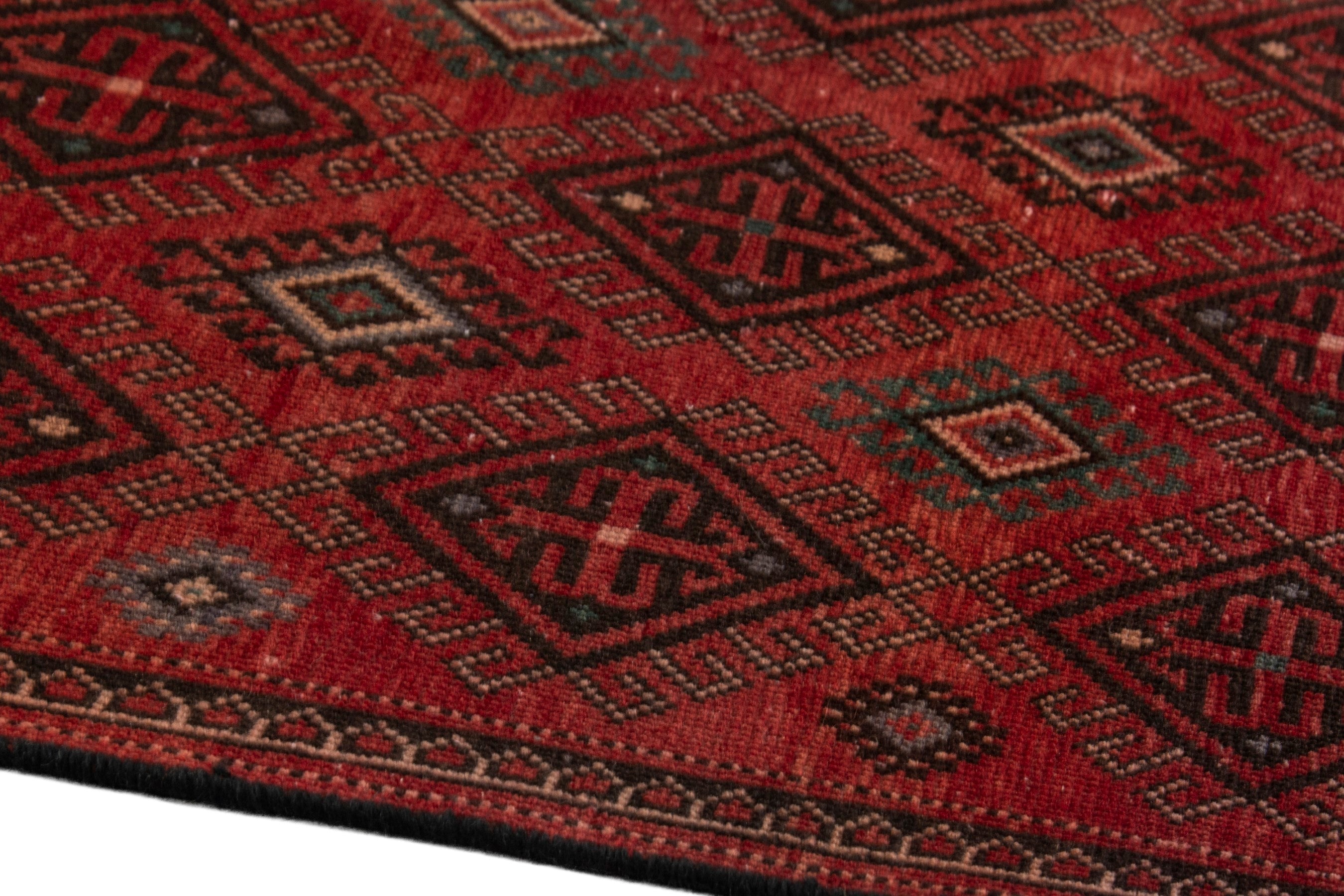 Persian Ghoochan runner rug in deep red and burgundy, view 6 of 17