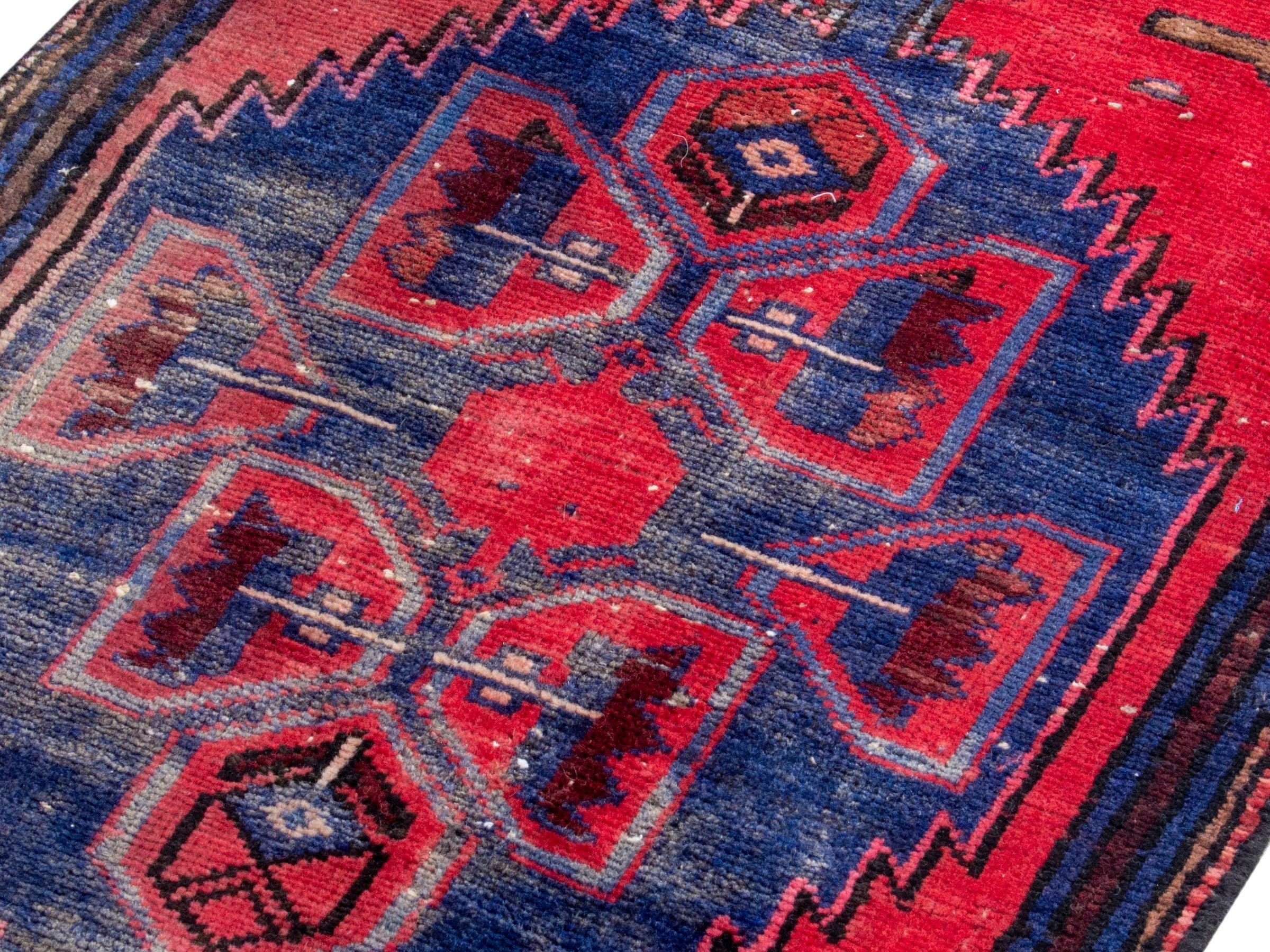 Persian Zanjan runner rug in deep red and dark blue, view 4 of 19