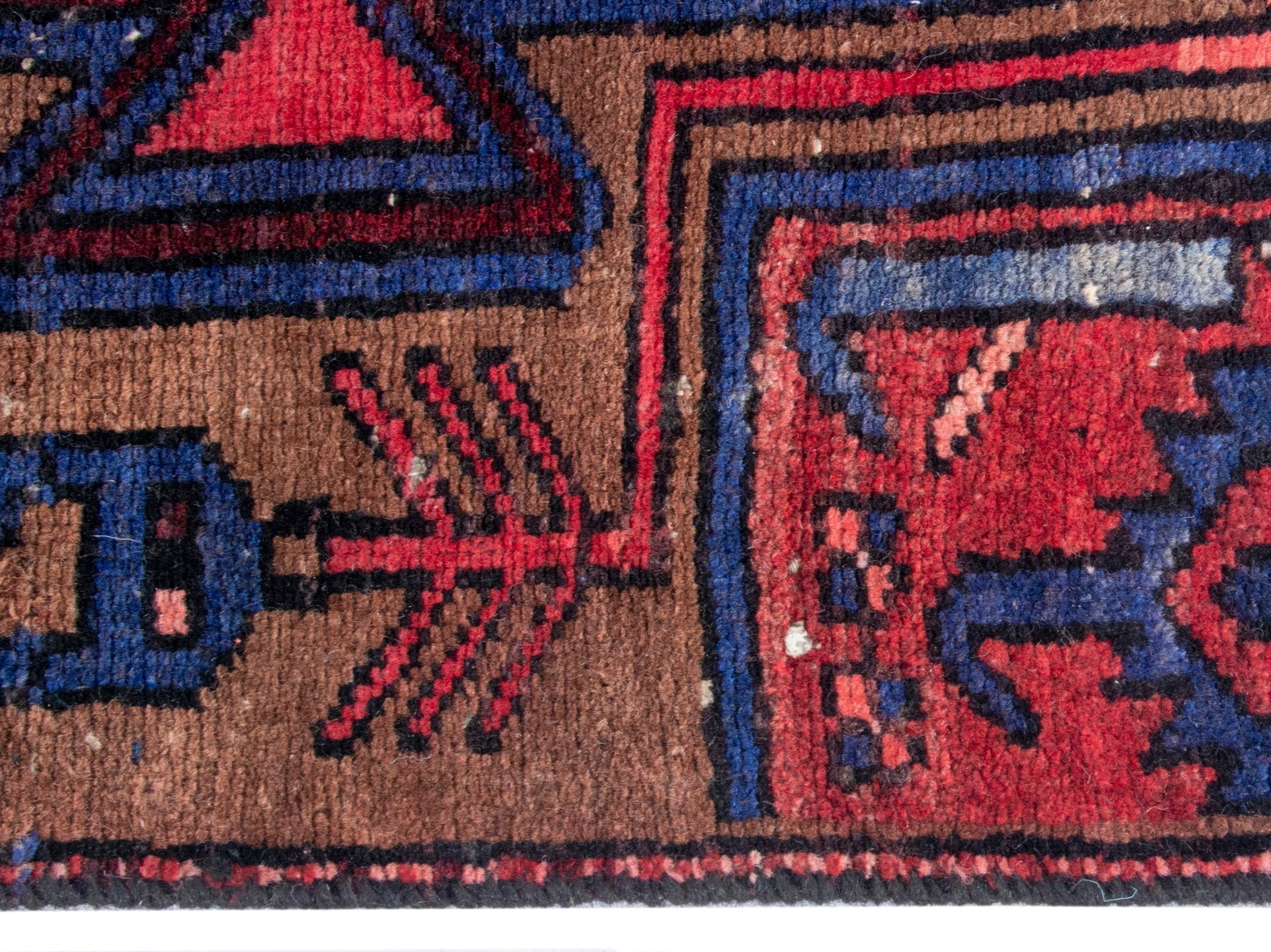 Persian Zanjan runner rug in deep red and dark blue, view 10 of 19