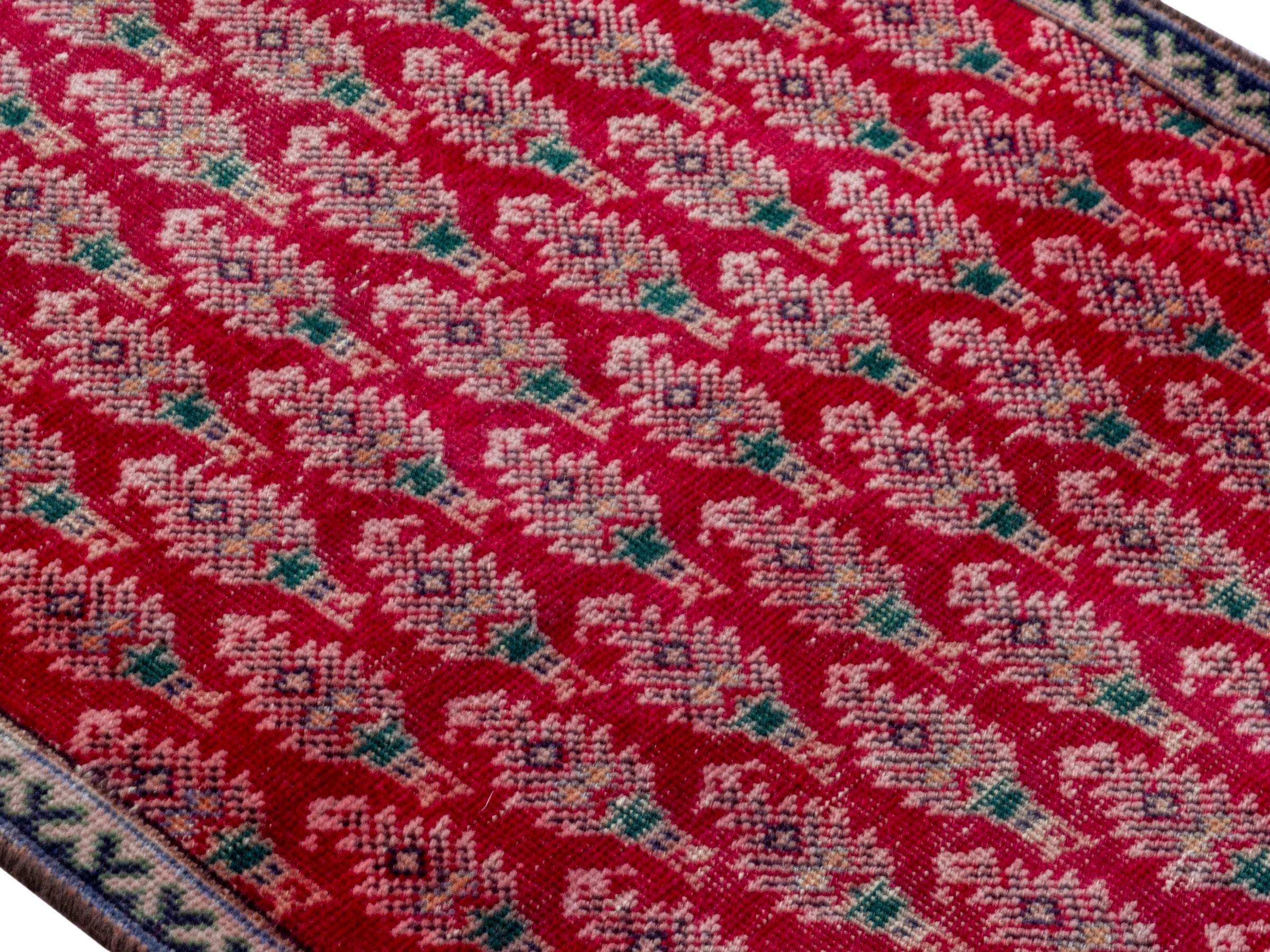 Persian Tabriz runner rug in deep red and dusty rose, view 4 of 16