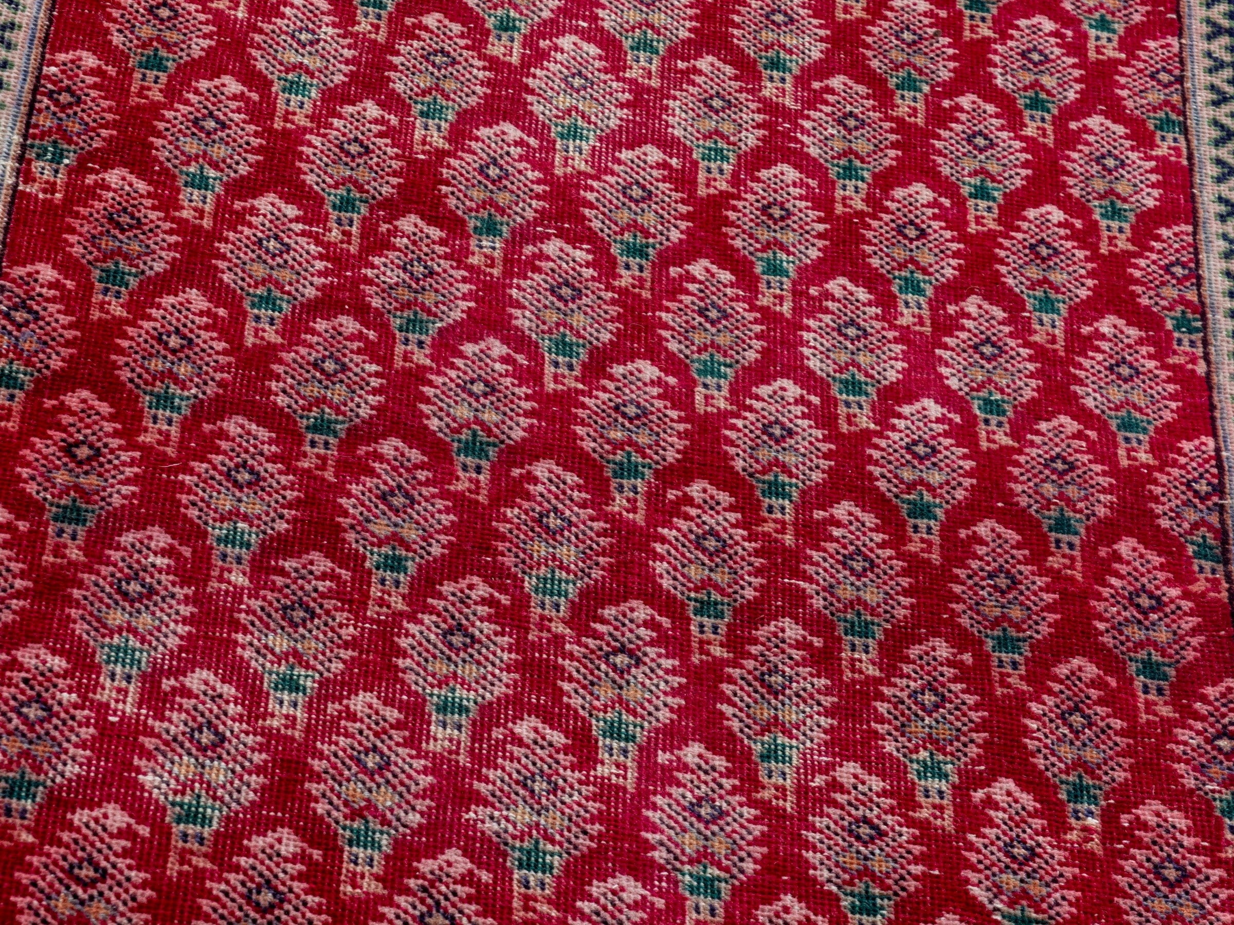 Persian Tabriz runner rug in deep red and dusty rose, view 9 of 16